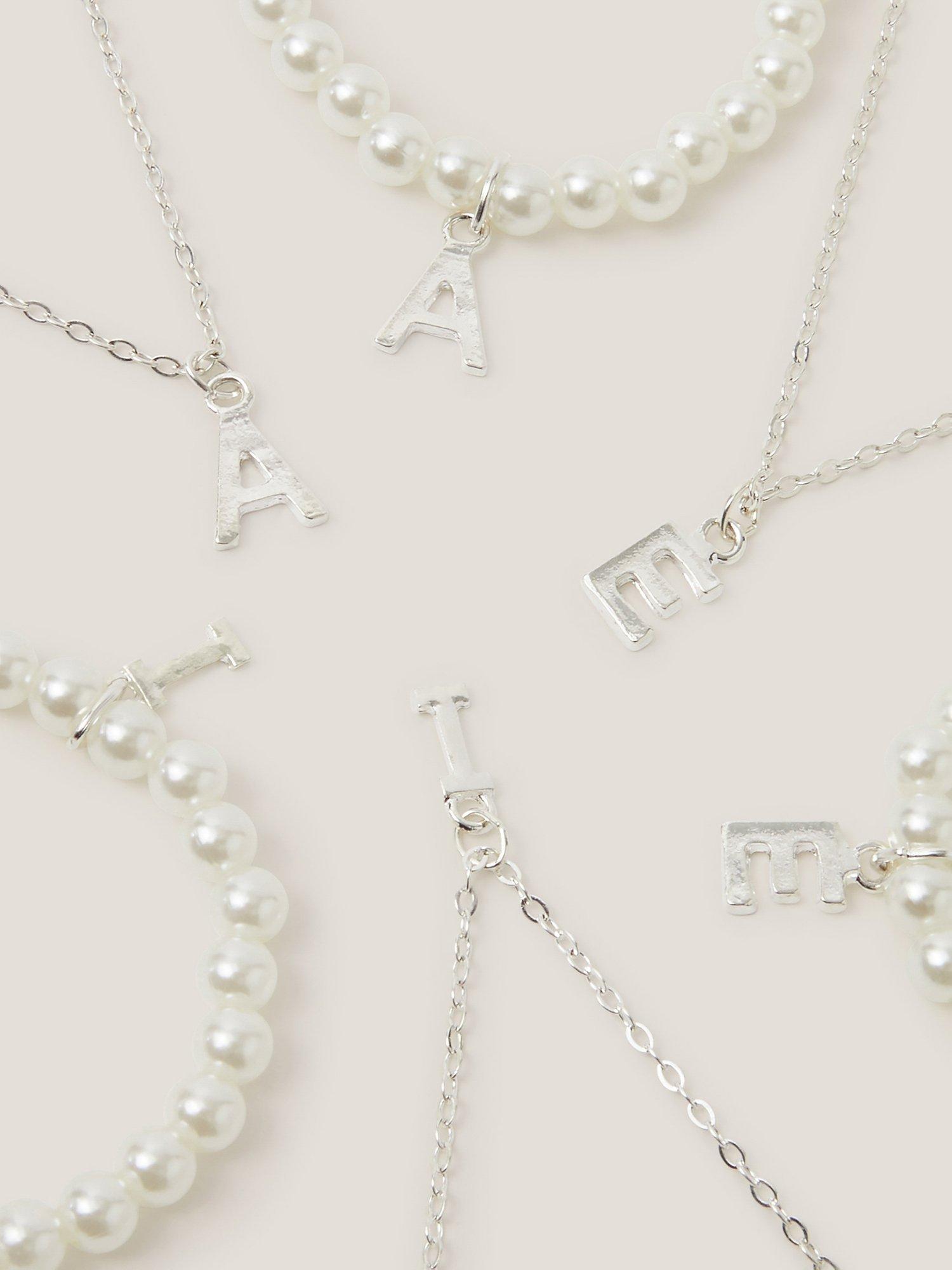 Product image 4 of 4, which shows Monsoon Kids' 'A' Initial Jewellery Set, Multi