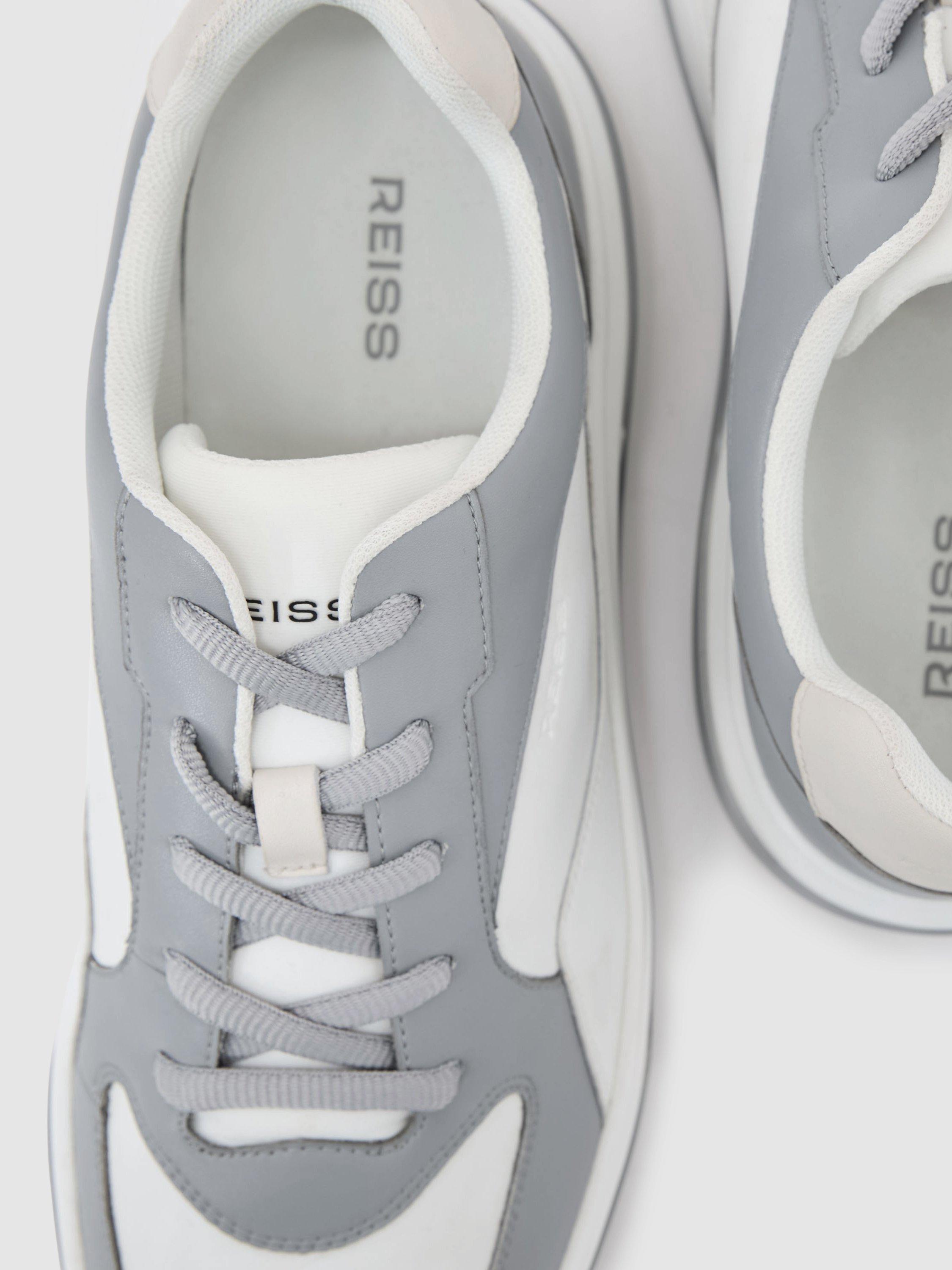 Product image 2 of 5, which shows Reiss Cast Leather Chunky Sole Trainers, Dusty Blue/White, 7