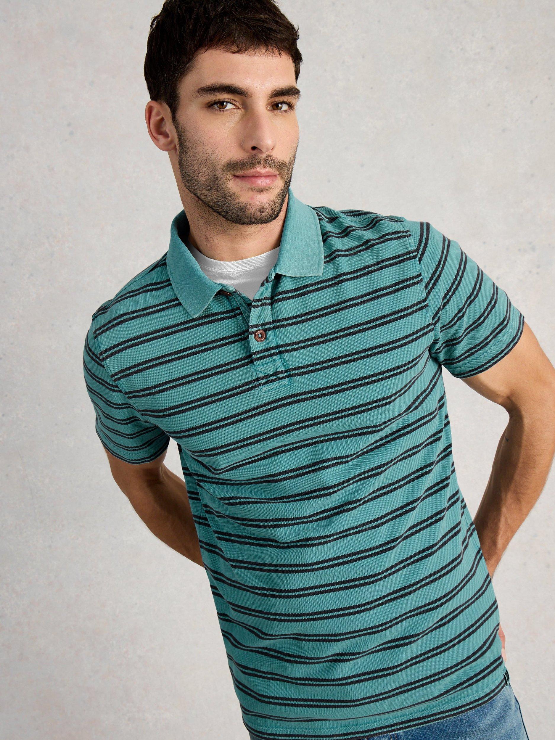 Product image 4 of 6, which shows White Stuff Garment Dyed Cotton Regular Fit Stripe Polo Shirt, Blue/Multi, S Reg