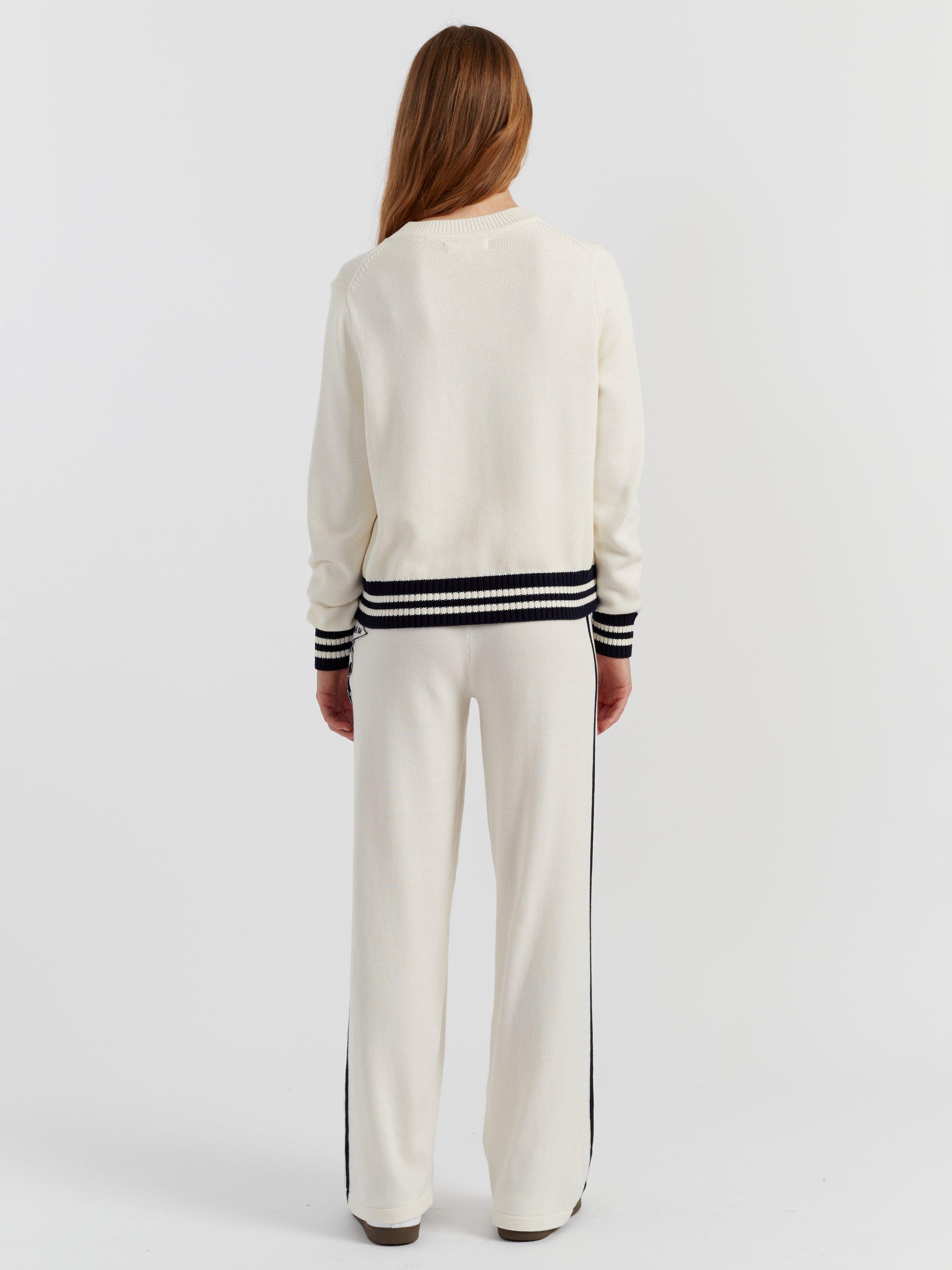 Product image 2 of 4, which shows Chinti & Parker Snoopy Varsity Jumper, Cream, XS