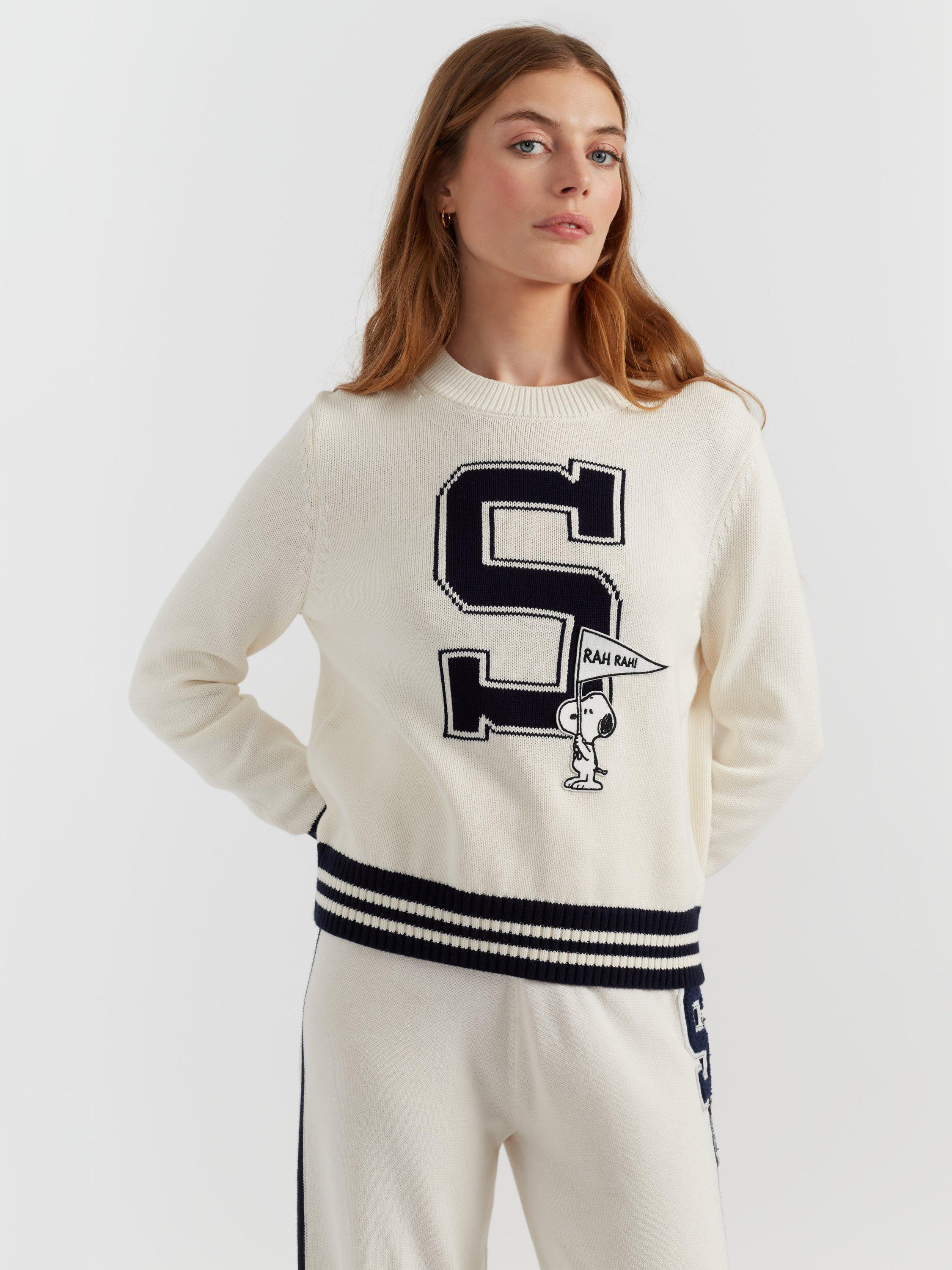 Product image 3 of 4, which shows Chinti & Parker Snoopy Varsity Jumper, Cream, XS
