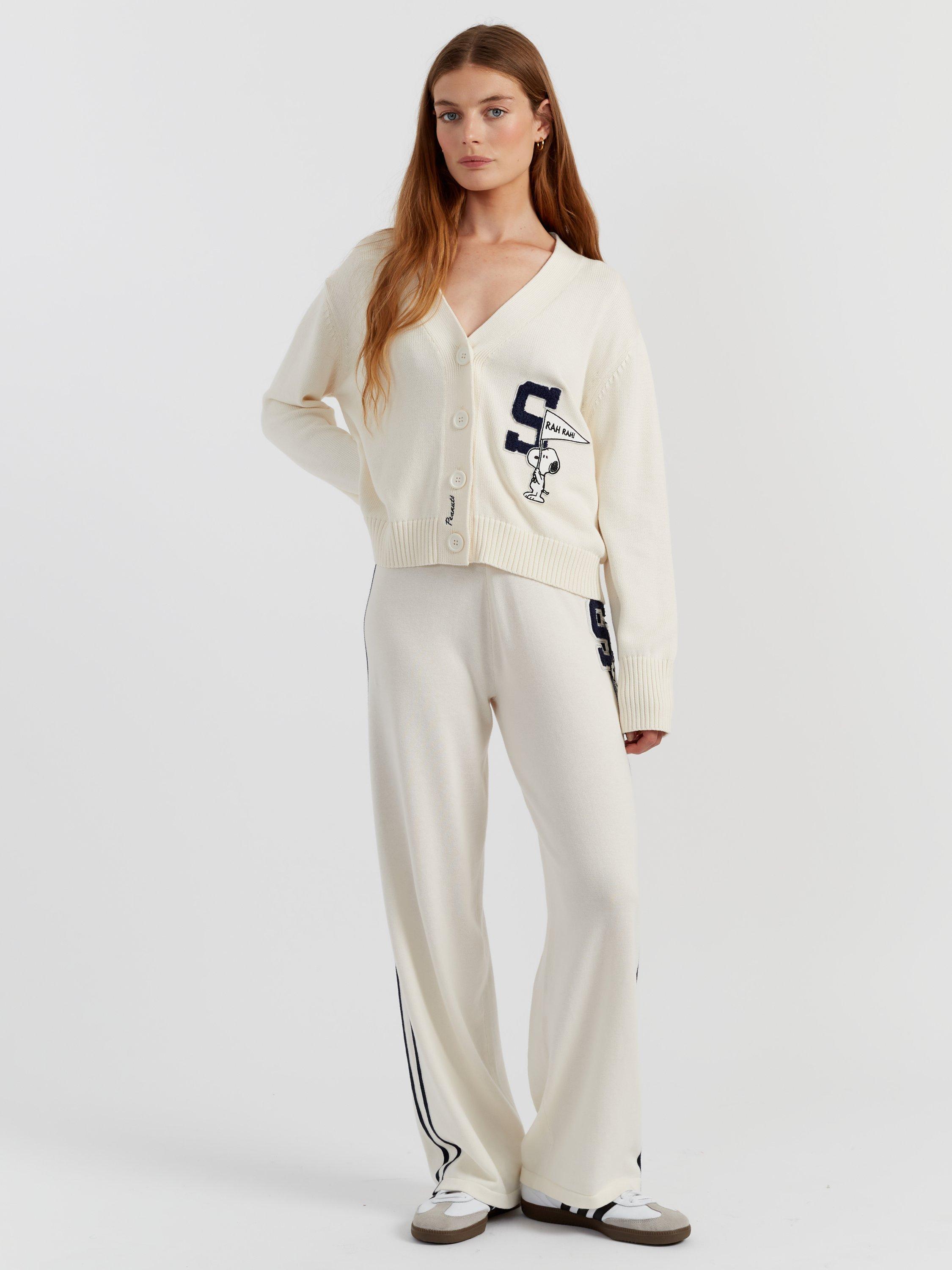 Product image 1 of 4, which shows Chinti & Parker Snoopy Varsity Cardigan, Cream, XS