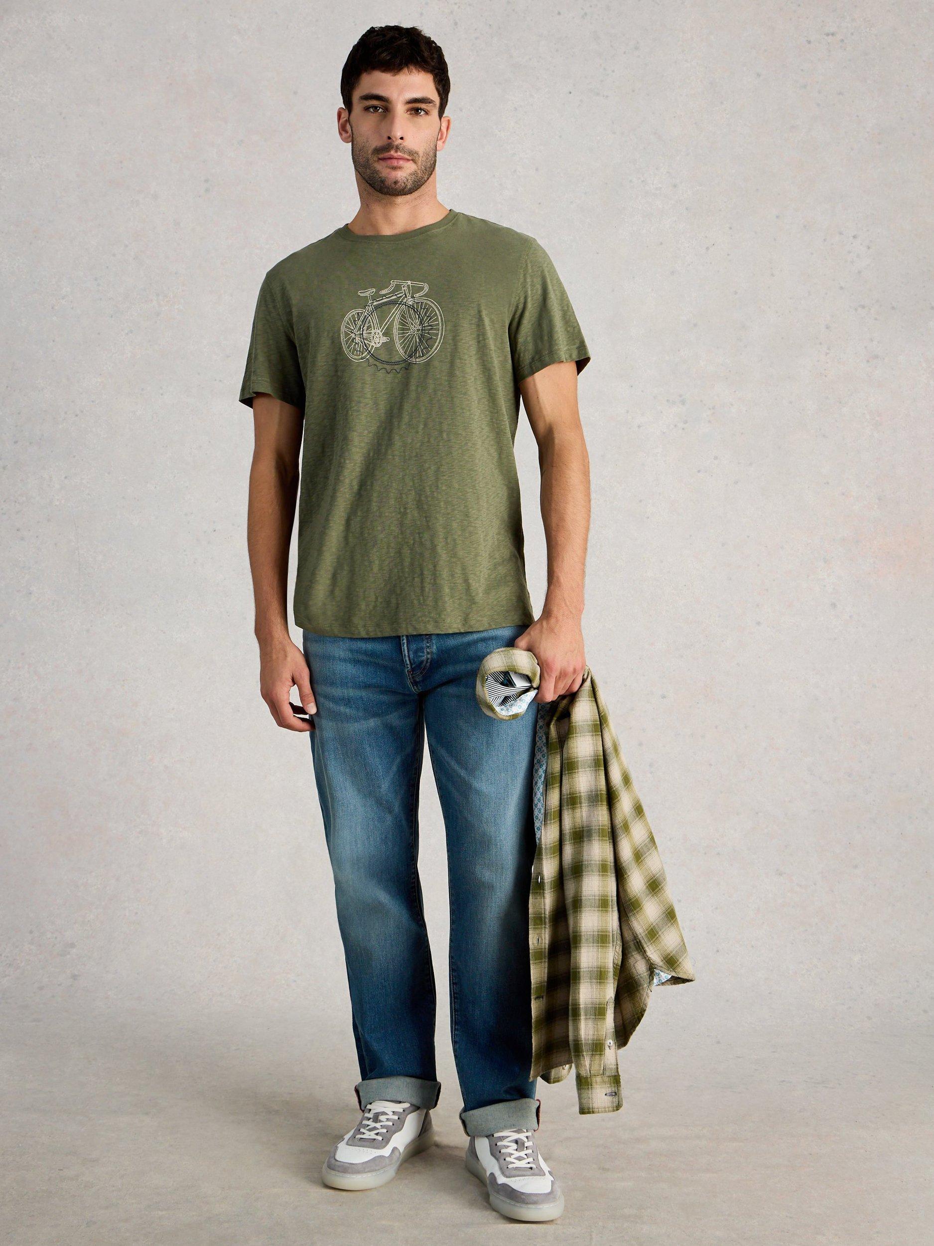 Product image 1 of 6, which shows White Stuff Abersoch Cotton Regular Fit Cogs Graphic T-Shirt, Mid Green, S Reg