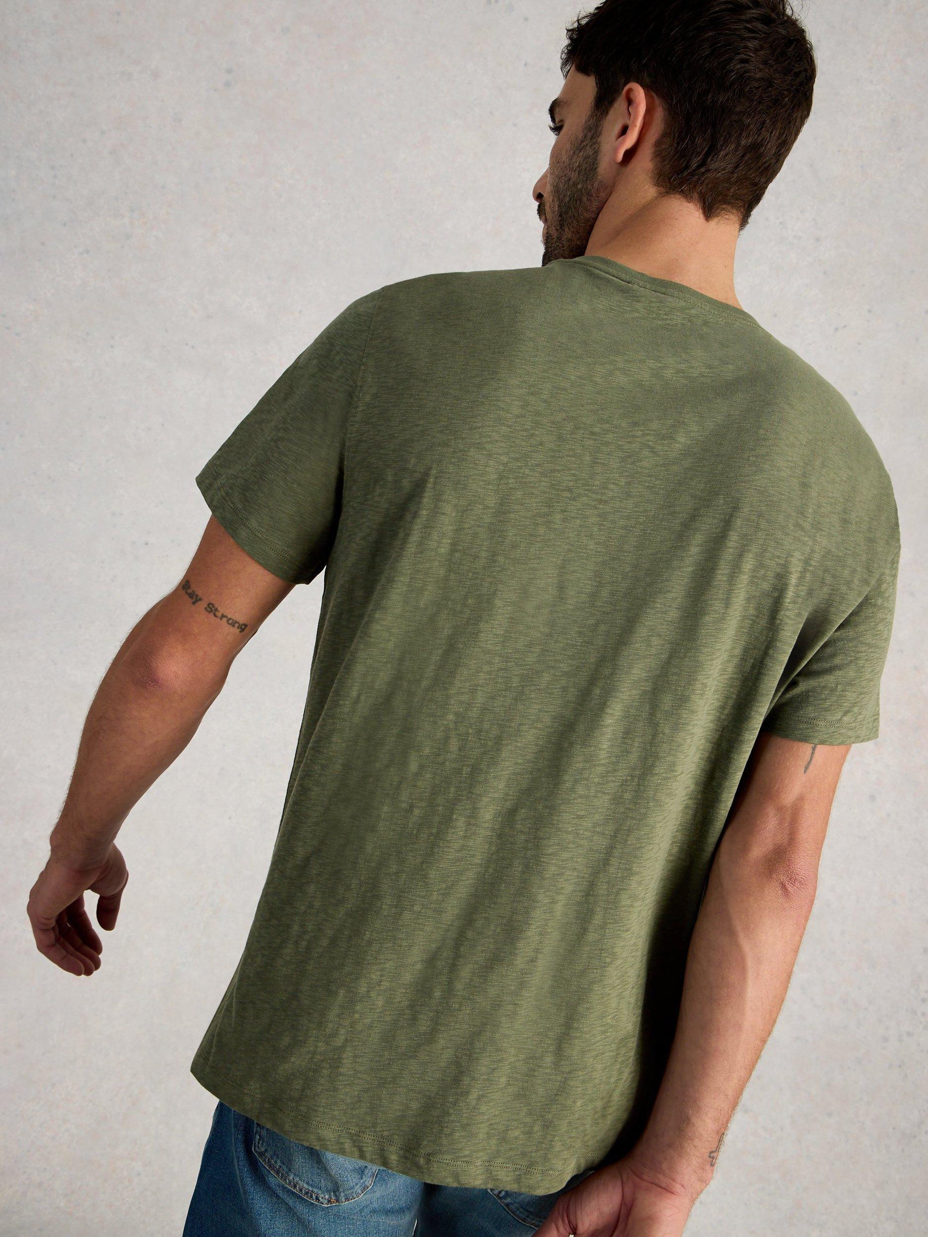 Product image 2 of 6, which shows White Stuff Abersoch Cotton Regular Fit Cogs Graphic T-Shirt, Mid Green, S Reg