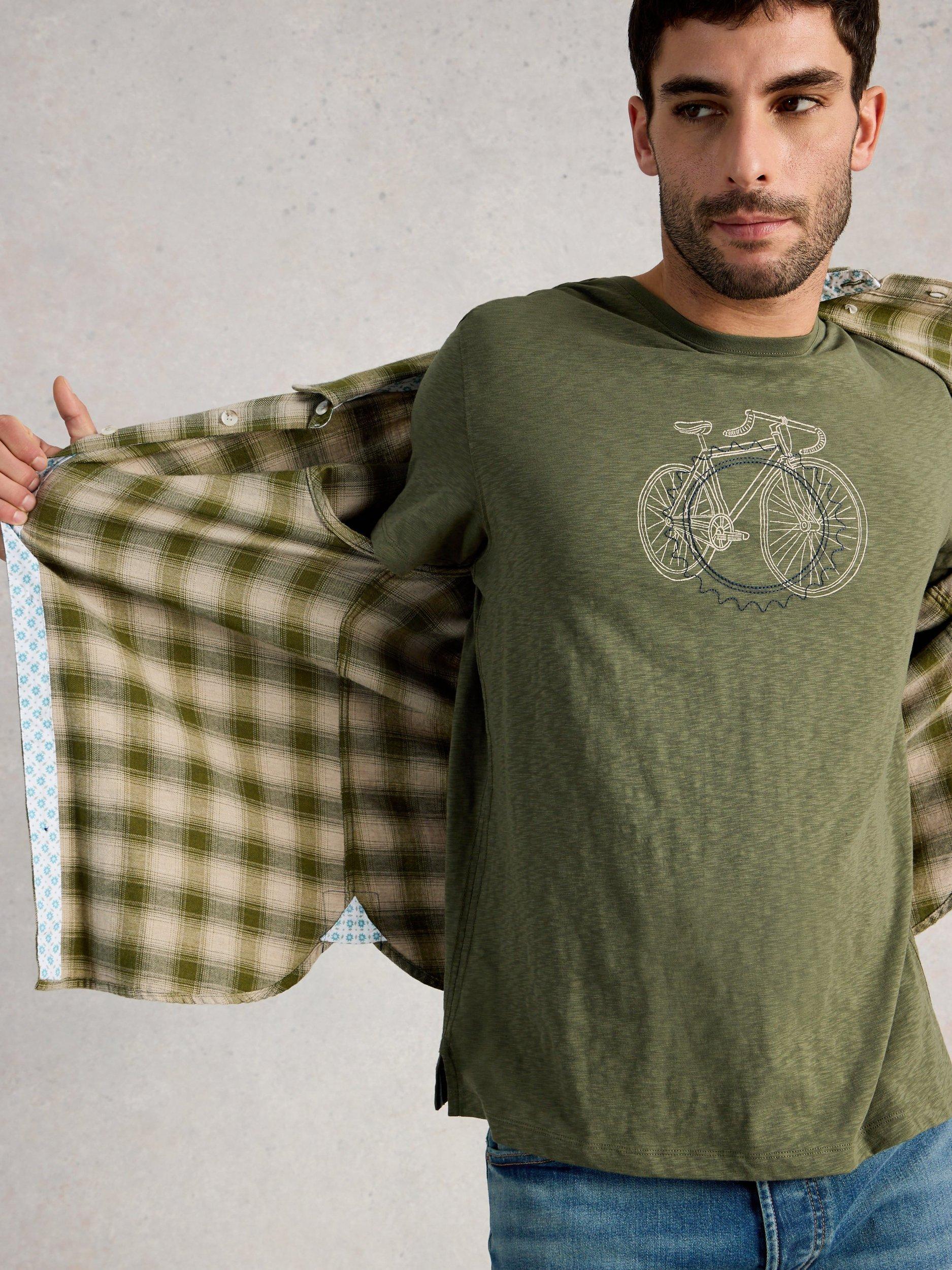 Product image 4 of 6, which shows White Stuff Abersoch Cotton Regular Fit Cogs Graphic T-Shirt, Mid Green, S Reg