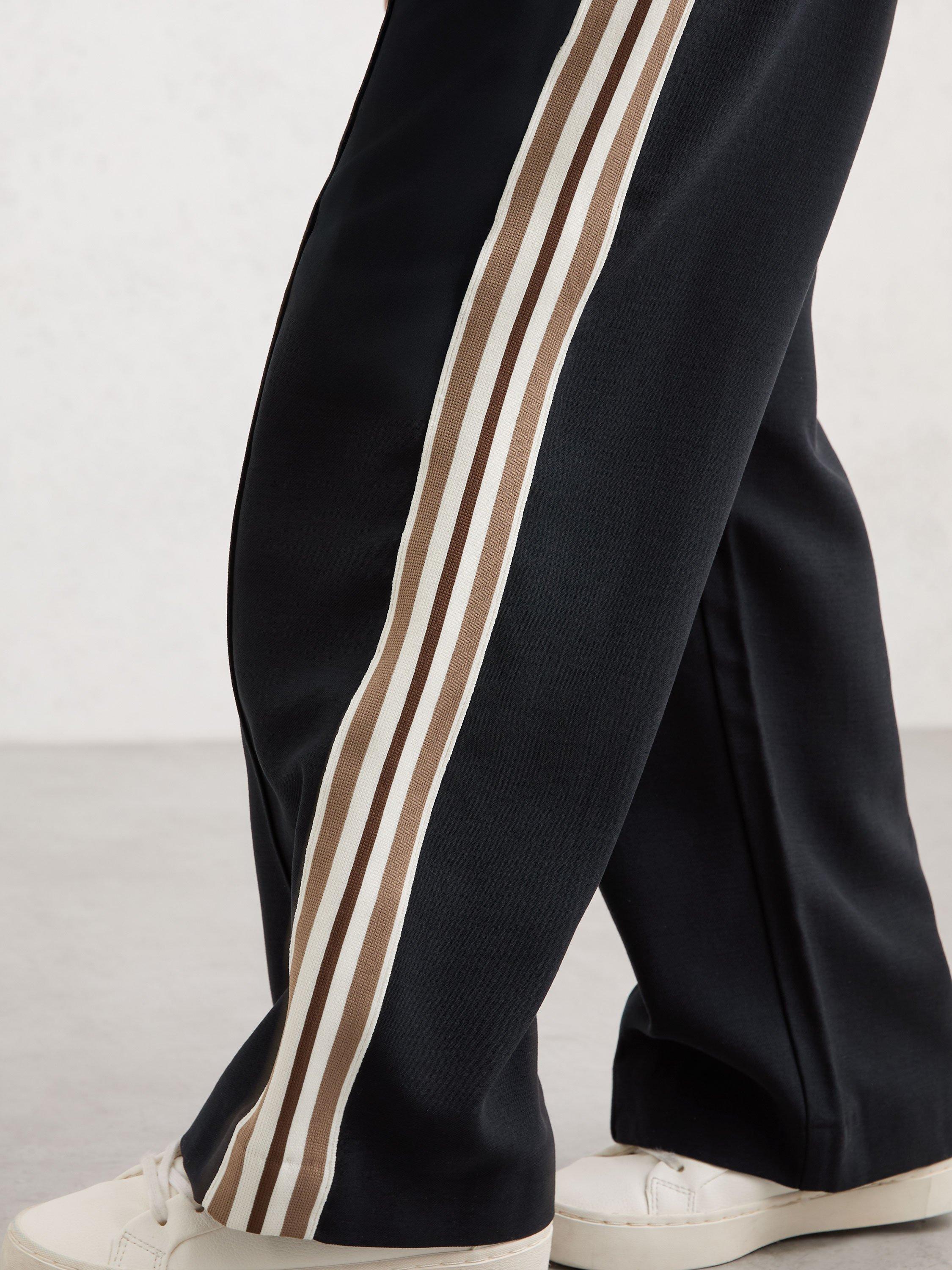 Product image 6 of 6, which shows Reiss Kids' Robyn Side Stripe Trousers, Navy, 3-4 years