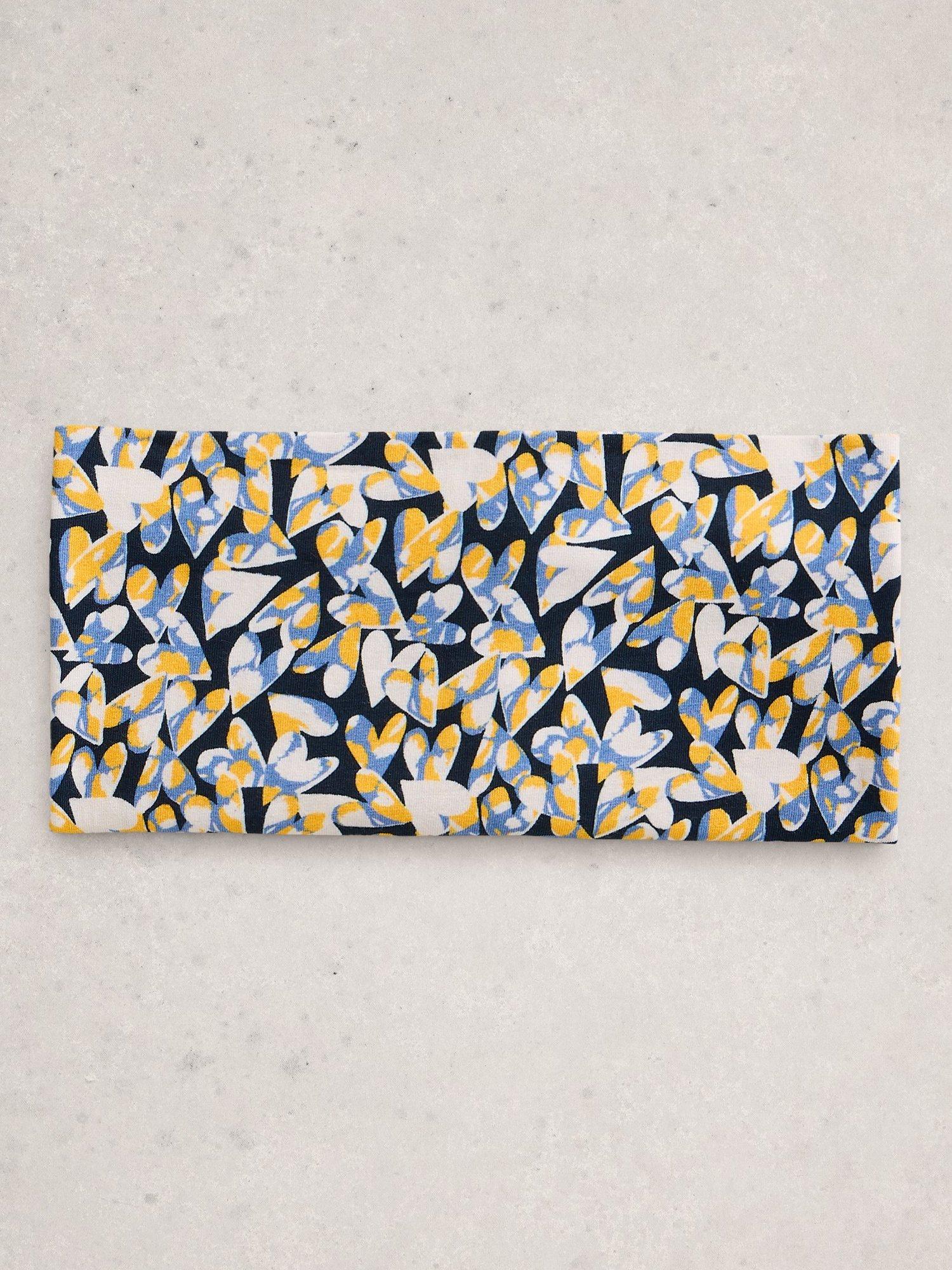 Product image 4 of 4, which shows White Stuff Heart Print Roll Scarf, Yellow/Multi, One Size