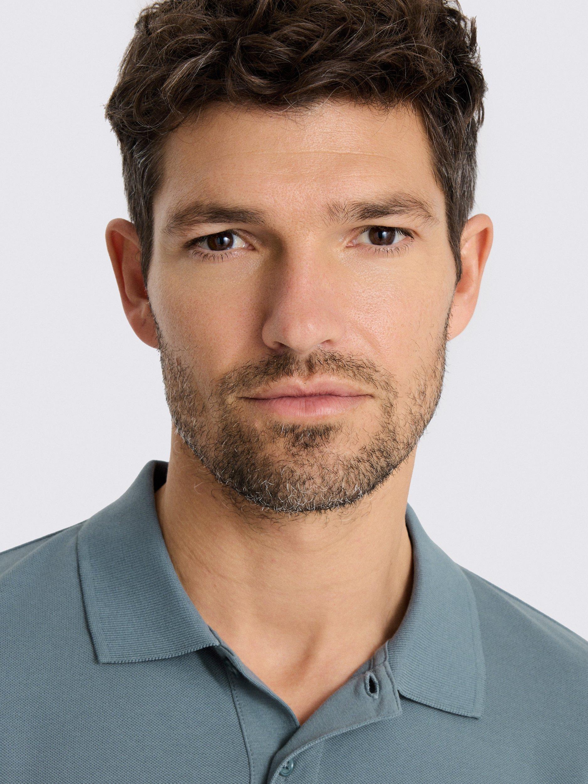 Product image 3 of 3, which shows Moss Pique Short Sleeve Polo Shirt, Teal, S