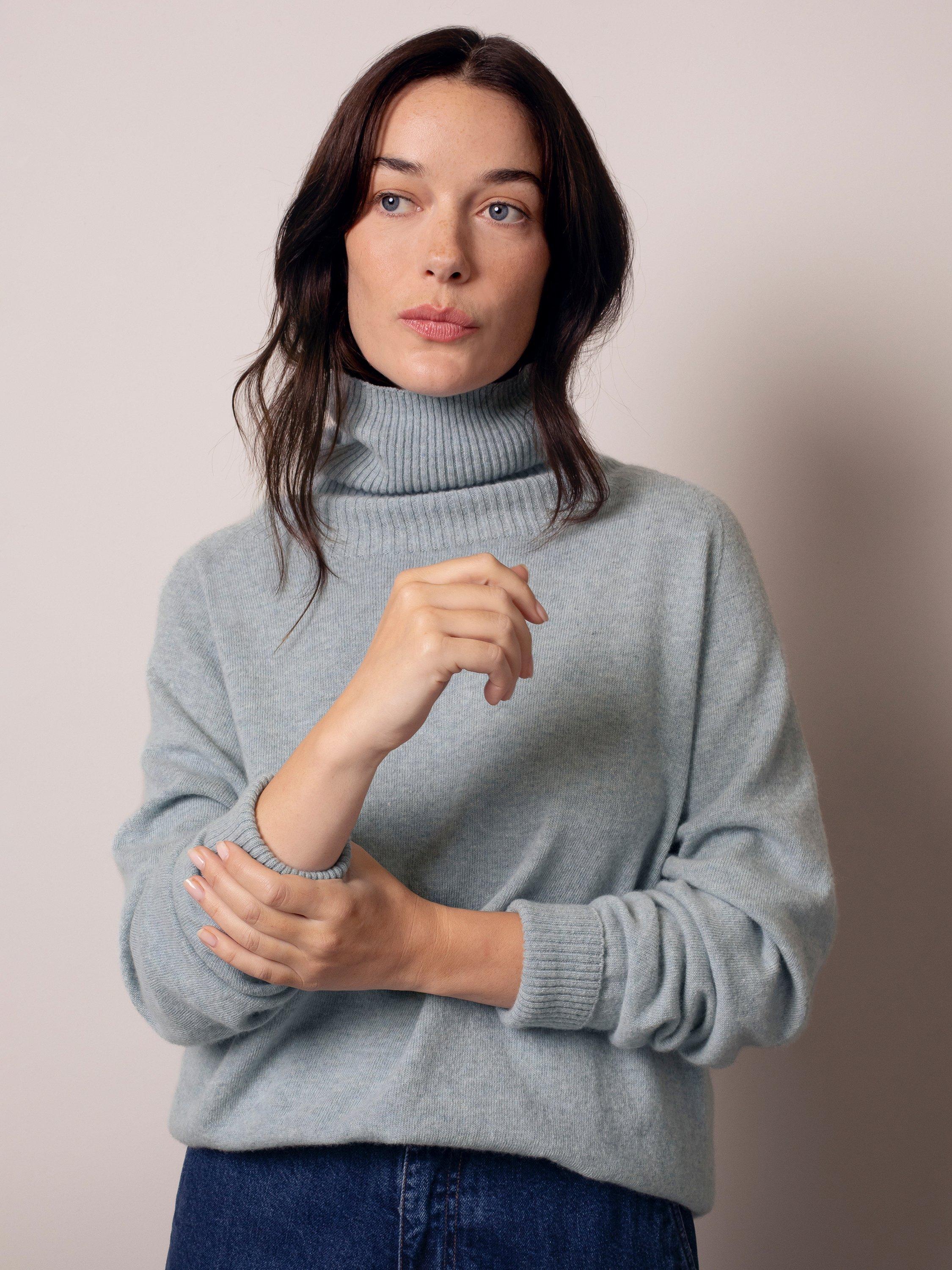 Product image 1 of 7, which shows Celtic & Co. Geelong Slouch Roll Neck Jumper, Skylight, XS