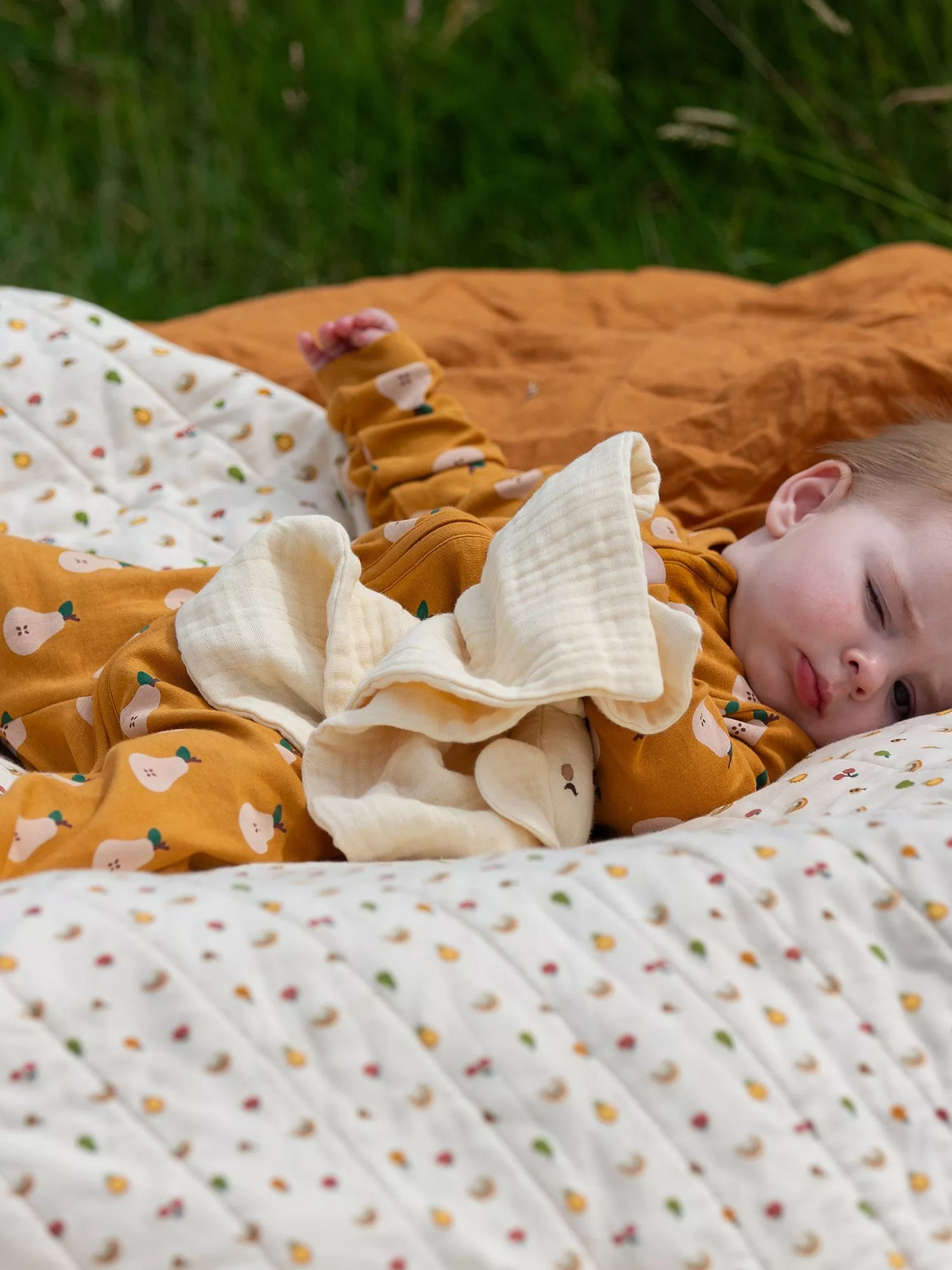 Young boy wearing animal pyjamas 