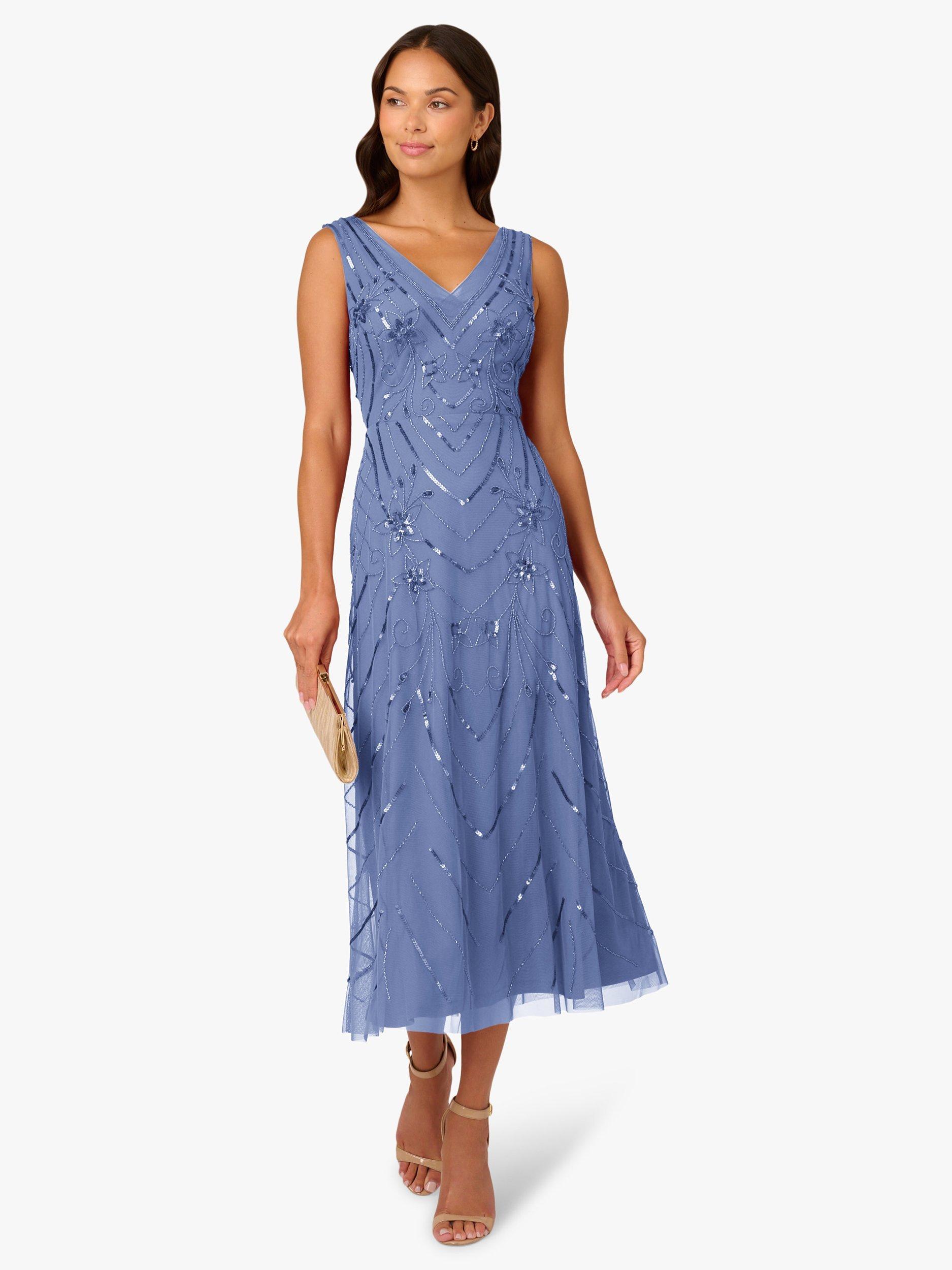 hand beaded ankle length dress in french blue Radiating elegance in every step , Wearing this stunning Off-Shoulder  Floral Beaded Godet Gown in French Blue by @adriannapapell  a brand that  truly celebrates every womans beauty. Whether youre