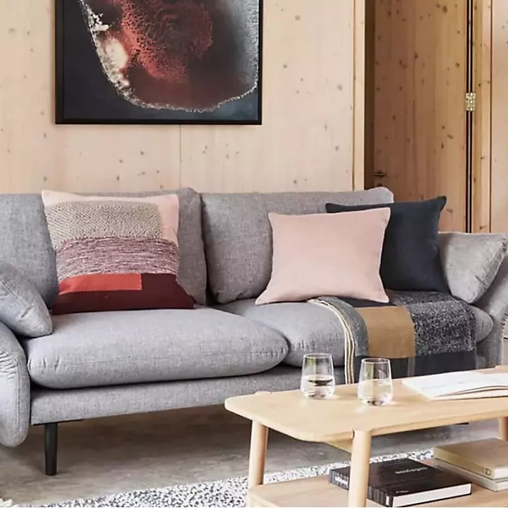 grey sofa with colourful scatter cushions