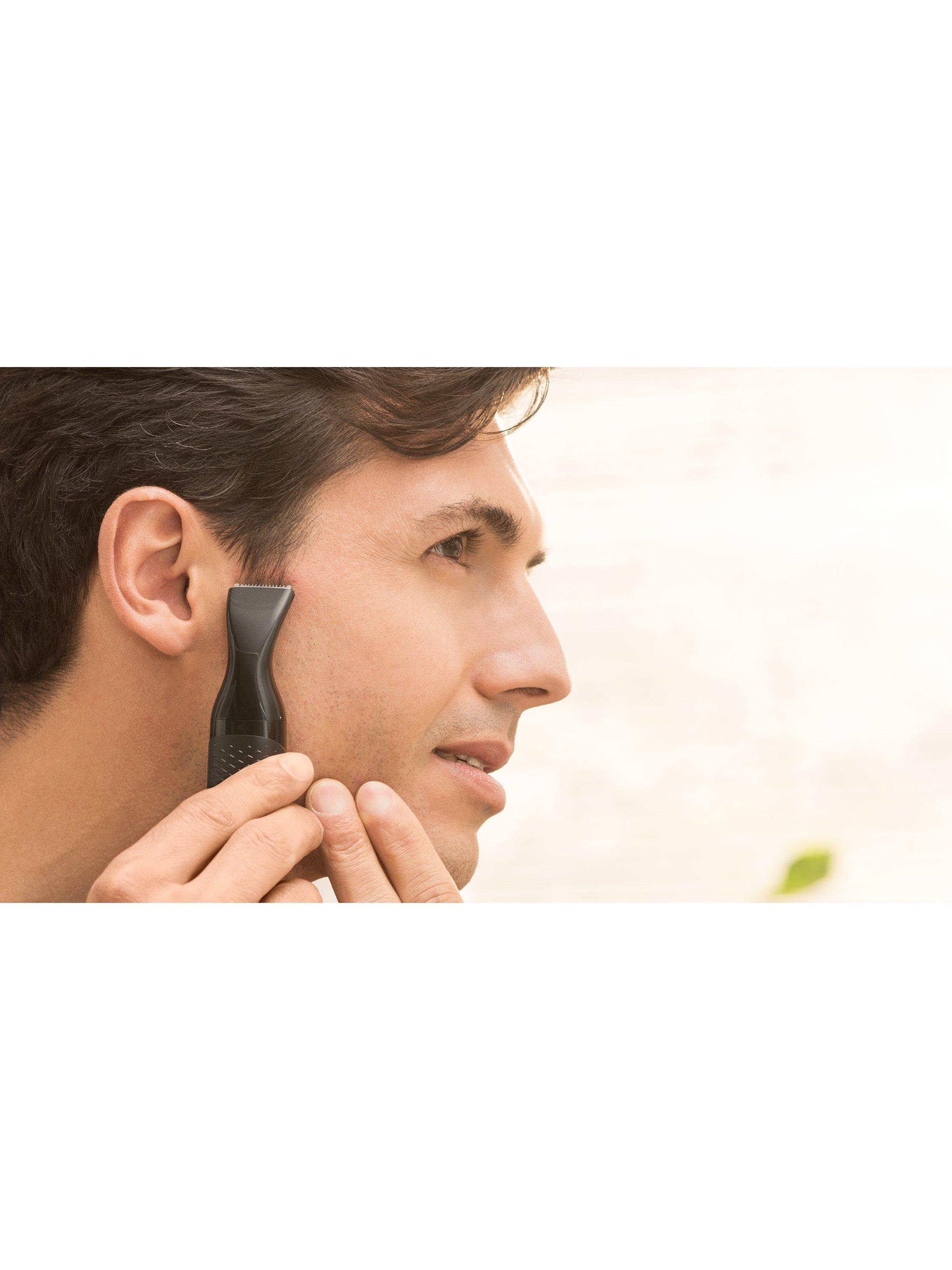 Product image 5 of 7, which shows Philips NT5650/16 Series 5000 Cordless Nose Trimmer, Ear & Eyebrow Trimmer, Black