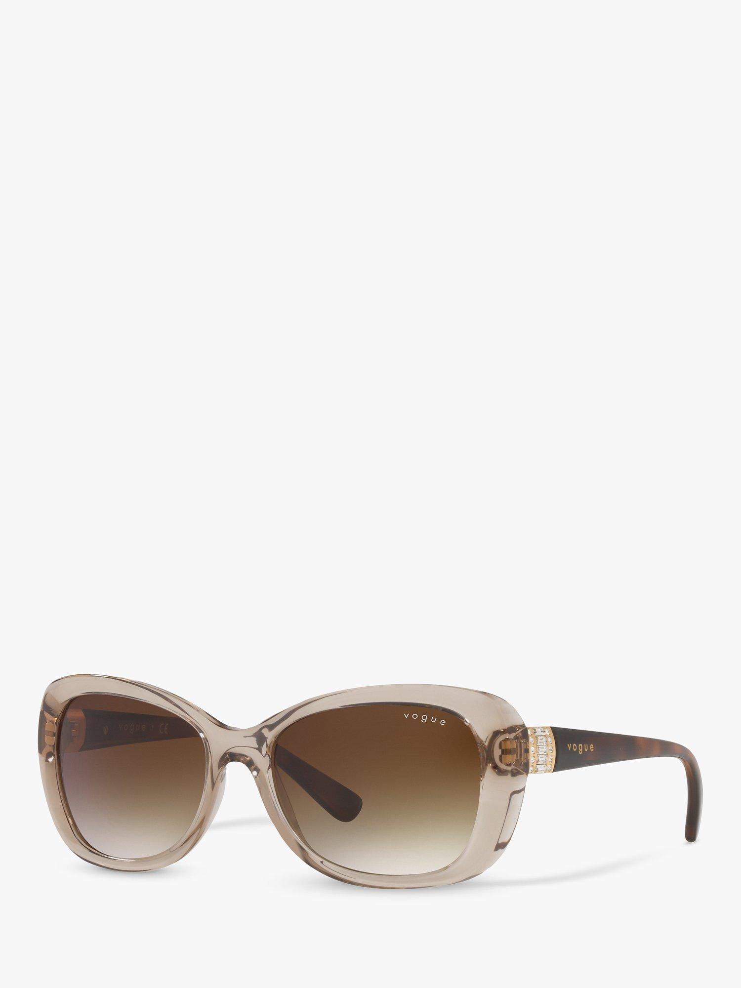 Product image 1 of 11, which shows Vogue VO2943SB Women's Butterfly Sunglasses, Transparent Light Brown/Brown Gradient