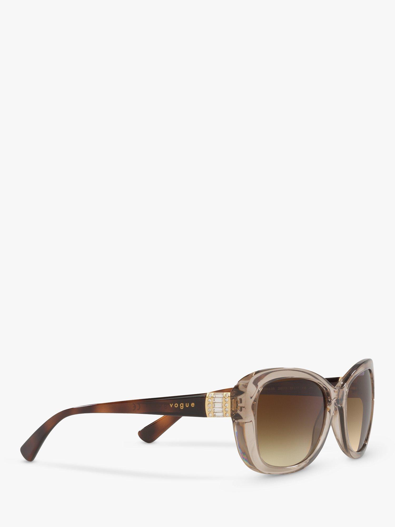 Product image 11 of 11, which shows Vogue VO2943SB Women's Butterfly Sunglasses, Transparent Light Brown/Brown Gradient