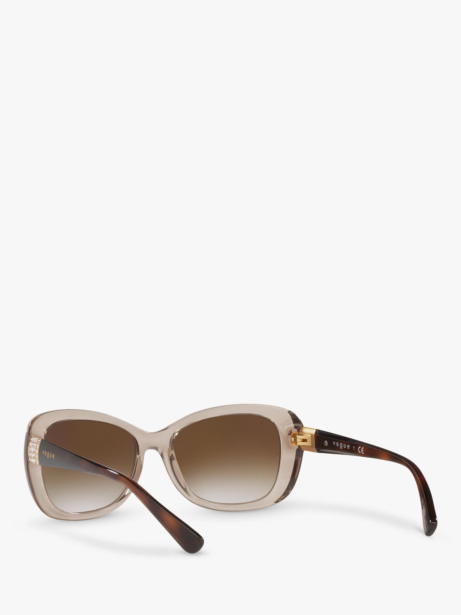 Product image 6 of 11, which shows Vogue VO2943SB Women's Butterfly Sunglasses, Transparent Light Brown/Brown Gradient