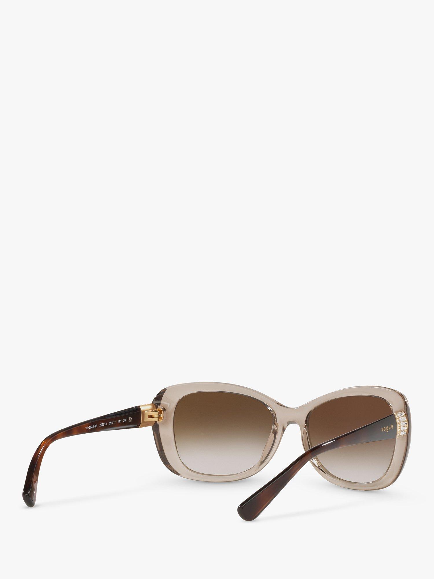 Product image 8 of 11, which shows Vogue VO2943SB Women's Butterfly Sunglasses, Transparent Light Brown/Brown Gradient