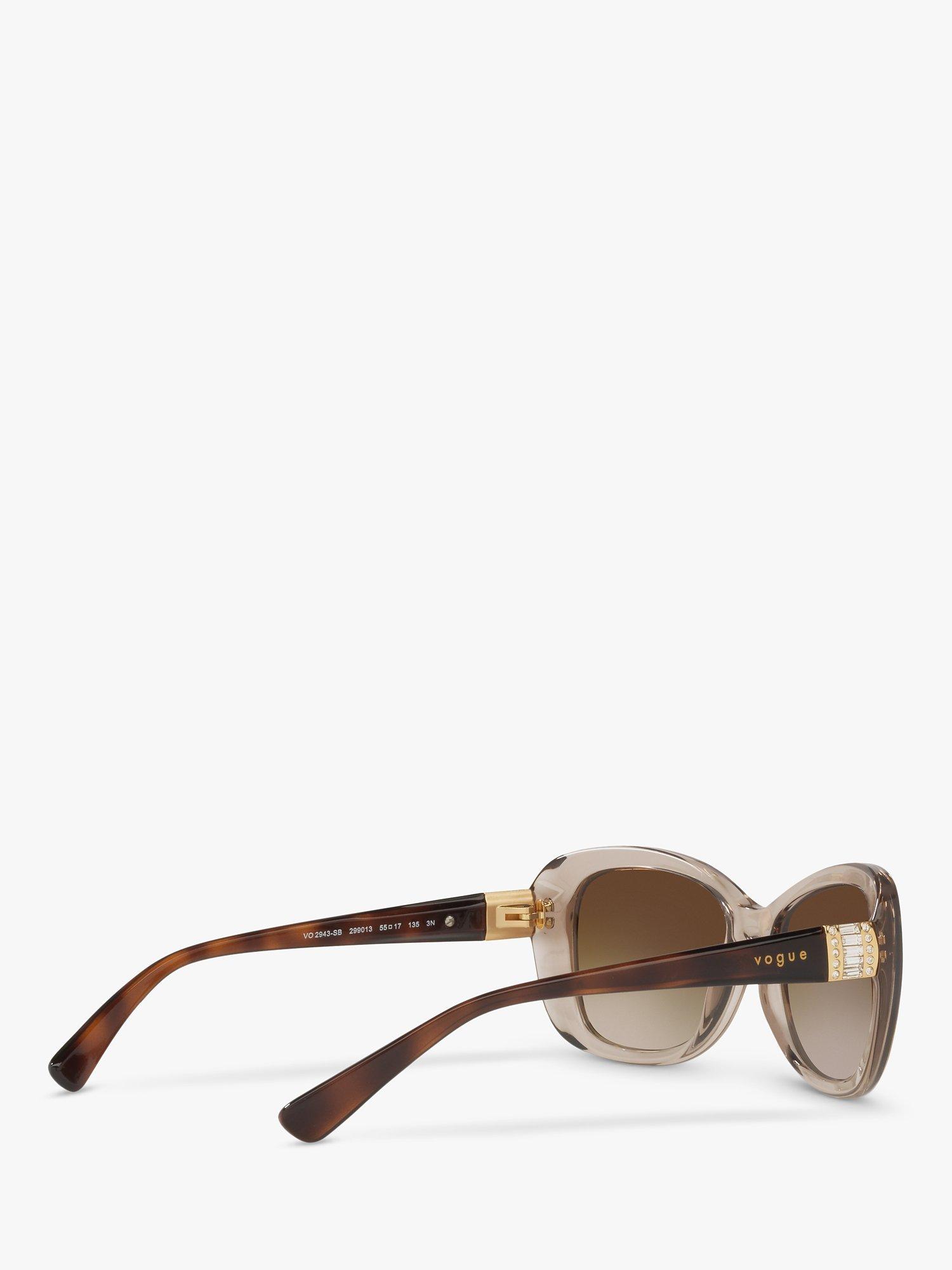 Product image 9 of 11, which shows Vogue VO2943SB Women's Butterfly Sunglasses, Transparent Light Brown/Brown Gradient