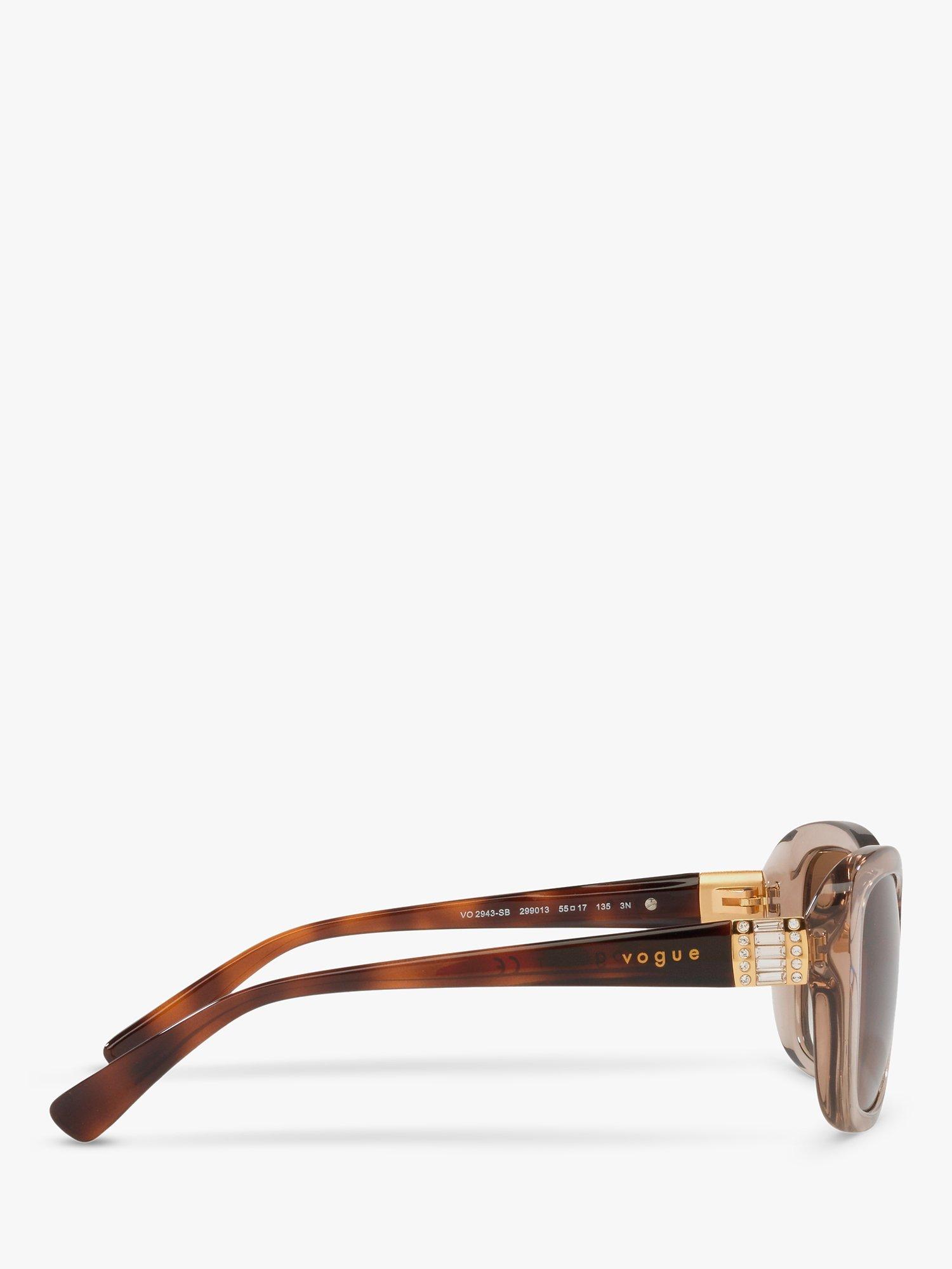 Product image 10 of 11, which shows Vogue VO2943SB Women's Butterfly Sunglasses, Transparent Light Brown/Brown Gradient