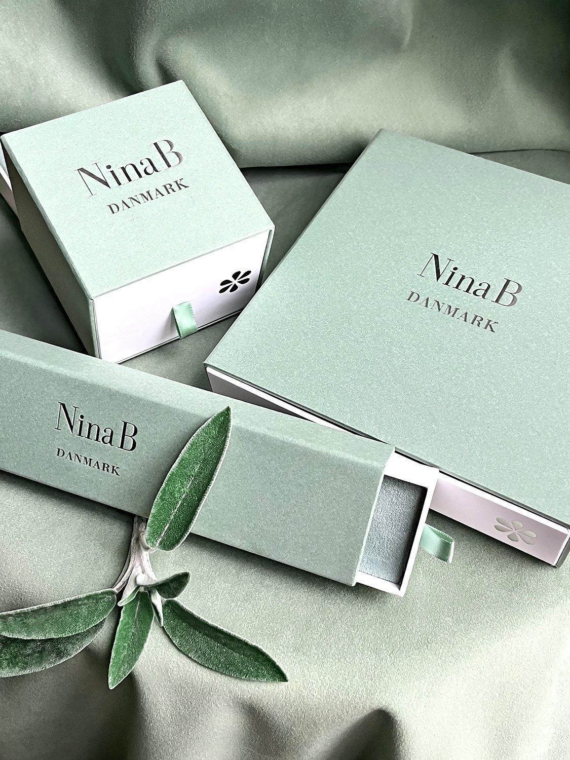 Product image 4 of 4, which shows Nina B Open Teardrop Necklace, Silver