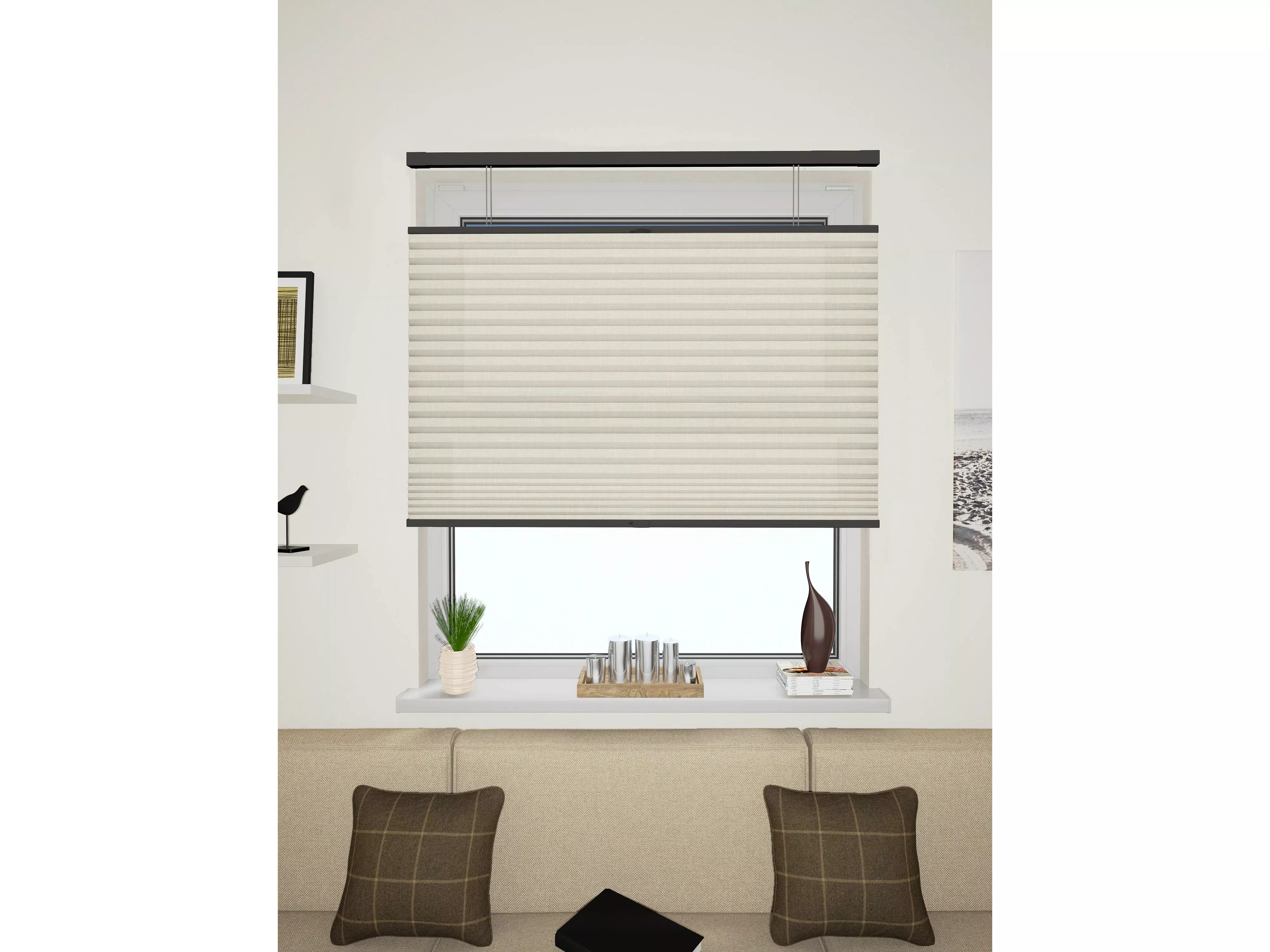 Cream pleated blind on living room window with black headrail, minimalist décor and neutral sofa cushions