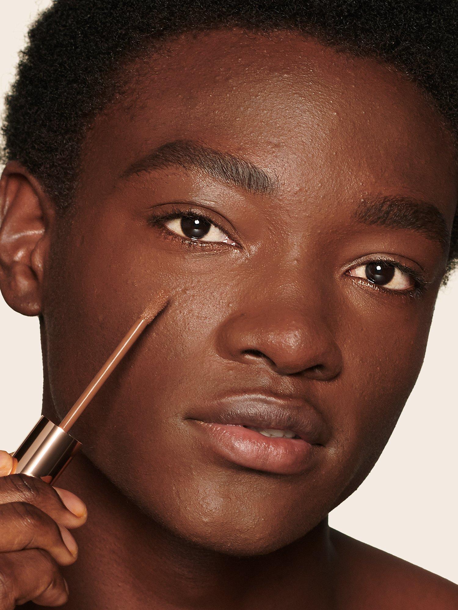 Product image 2 of 9, which shows Charlotte Tilbury Beautiful Skin Radiant Concealer, 17 Deep