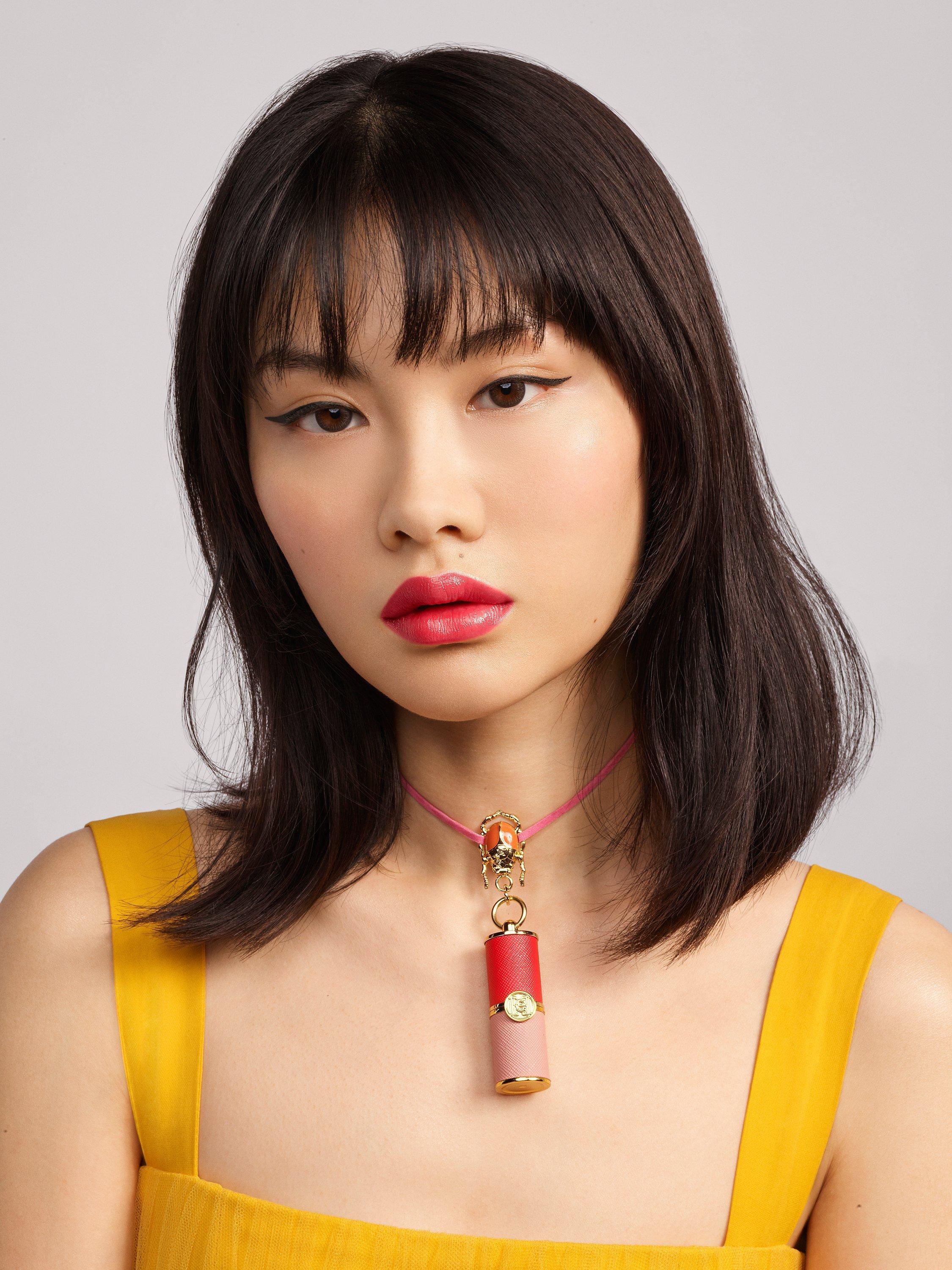 Product image 10 of 12, which shows Carolina Herrera Mini Tint Lip Balm Refill, 310 Carolina