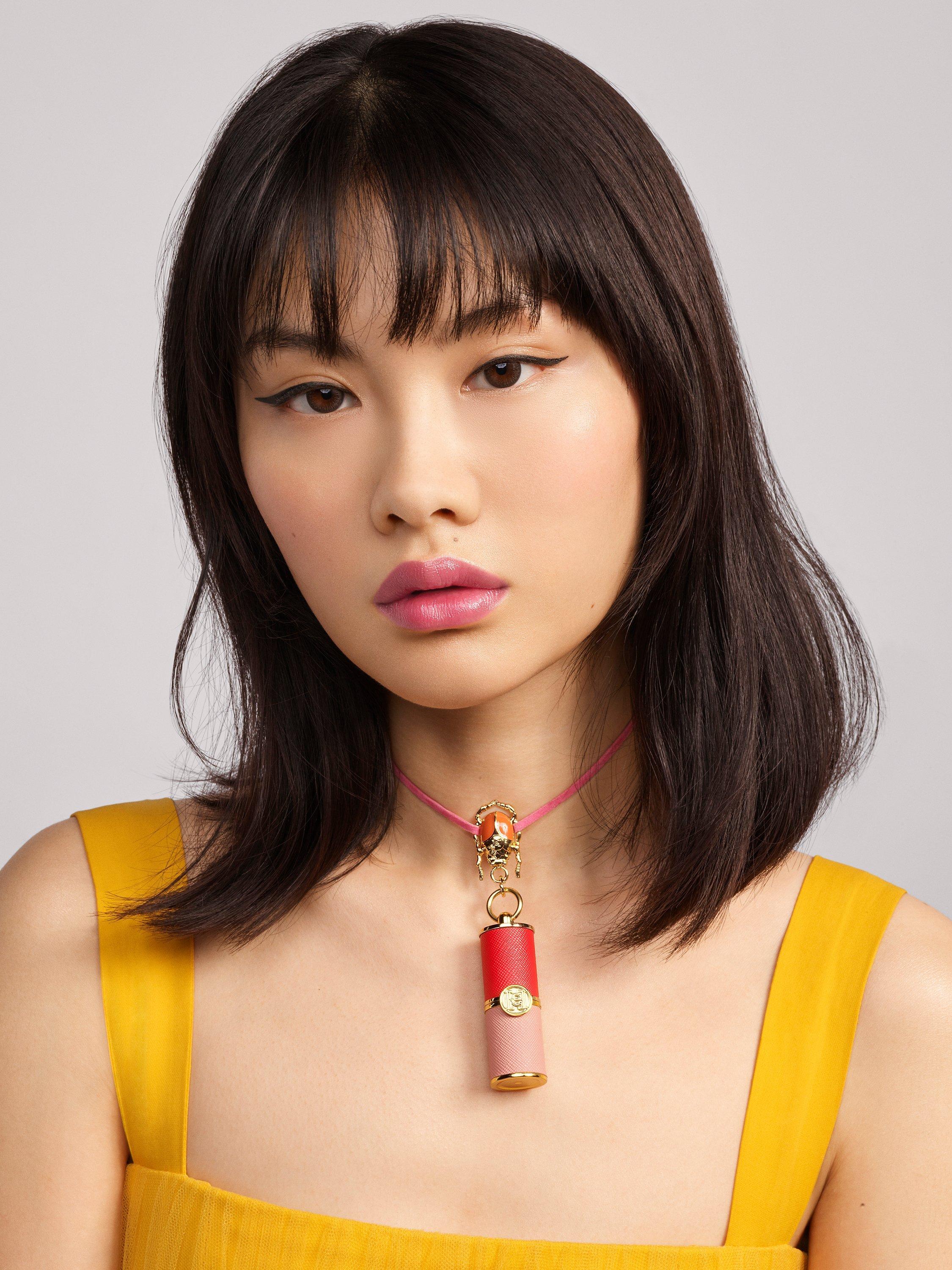 Product image 10 of 12, which shows Carolina Herrera Mini Tint Lip Balm Refill, 004 Pink Mania