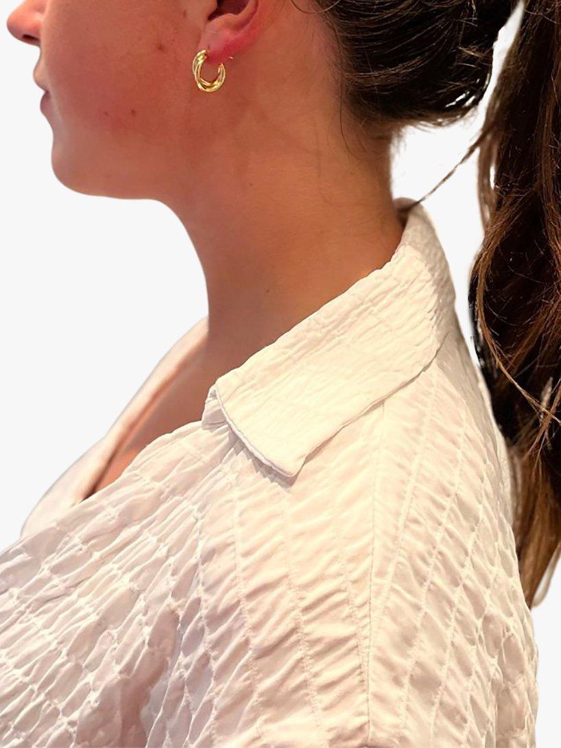 Product image 2 of 4, which shows The Hoop Station Duo Twist Huggie Hoop Earrings, Gold