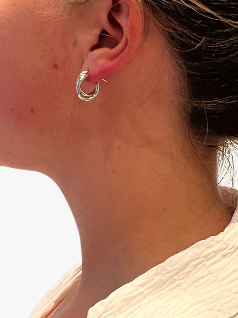 Product image 3 of 4, which shows The Hoop Station Duo Twist Huggie Hoop Earrings, Silver