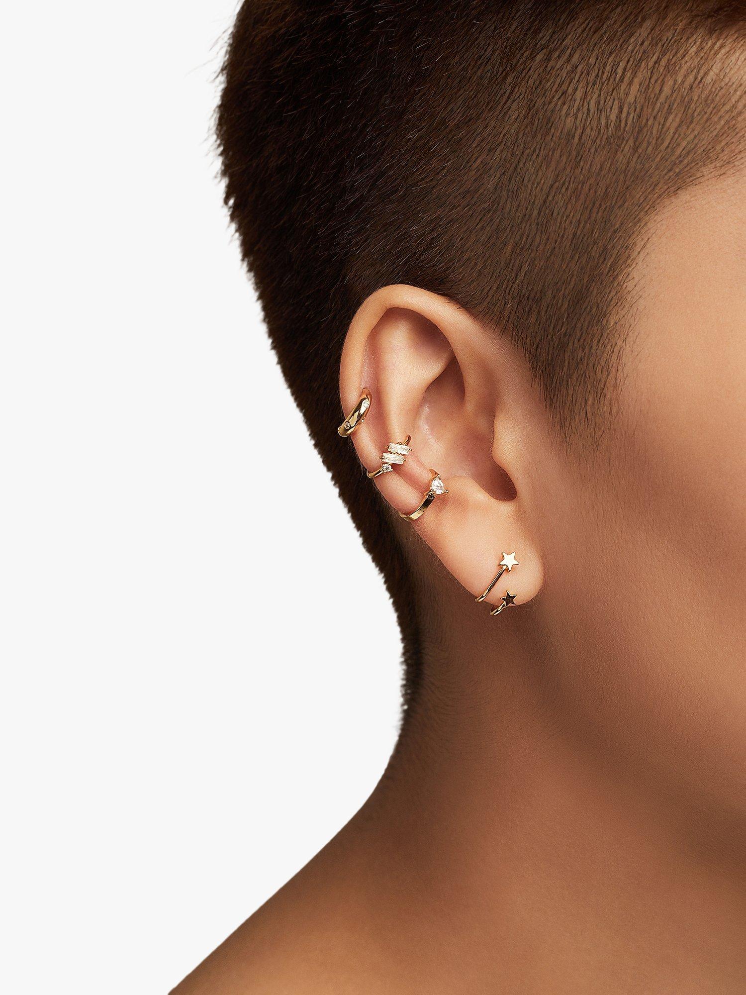 Product image 1 of 4, which shows Wanderlust + Co In The Stars Huggie Hoop Ear Cuffs, Gold