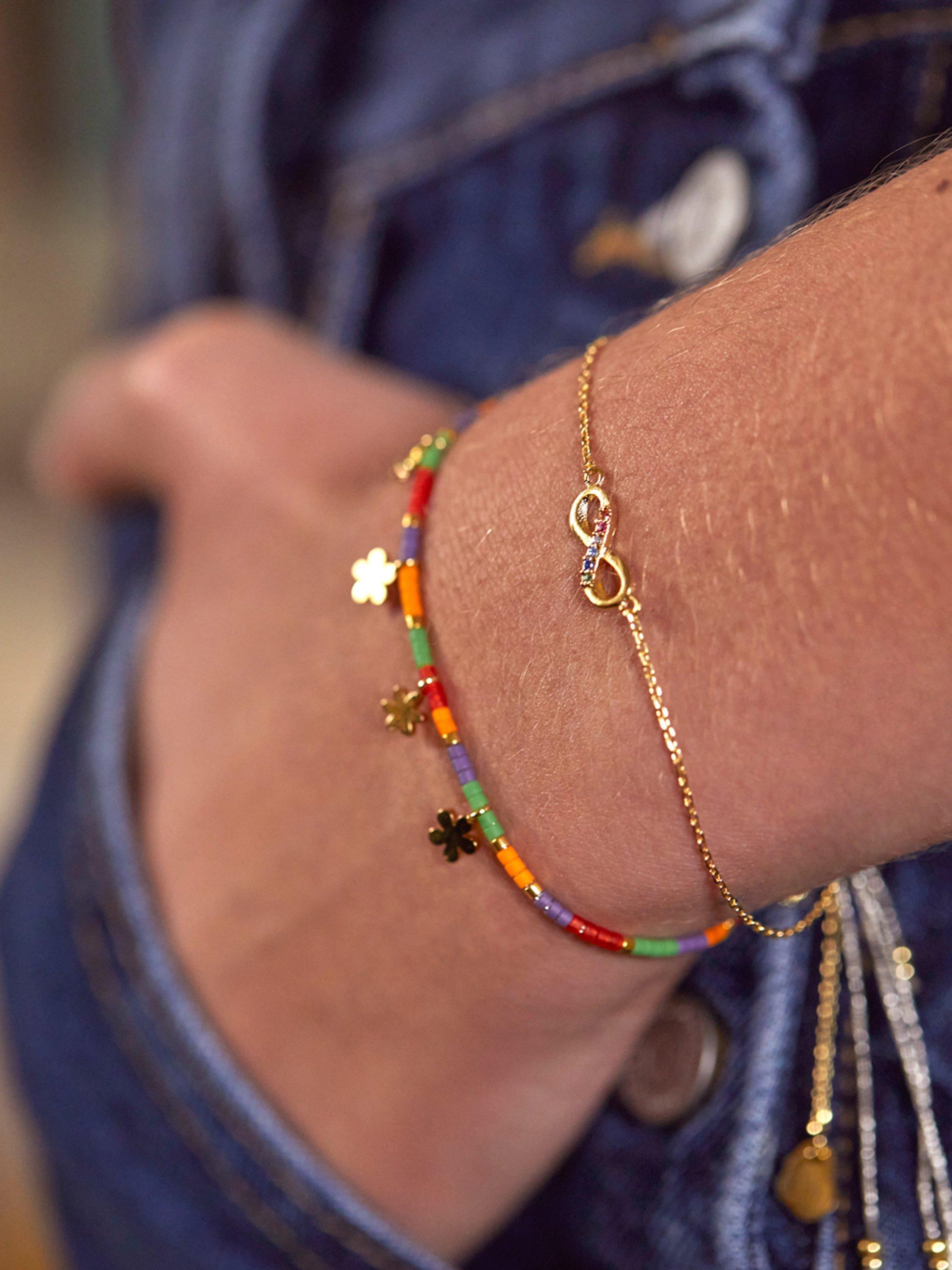 Product image 2 of 3, which shows Estella Bartlett Rainbow Cubic Zirconia Infinity Bracelet, Gold