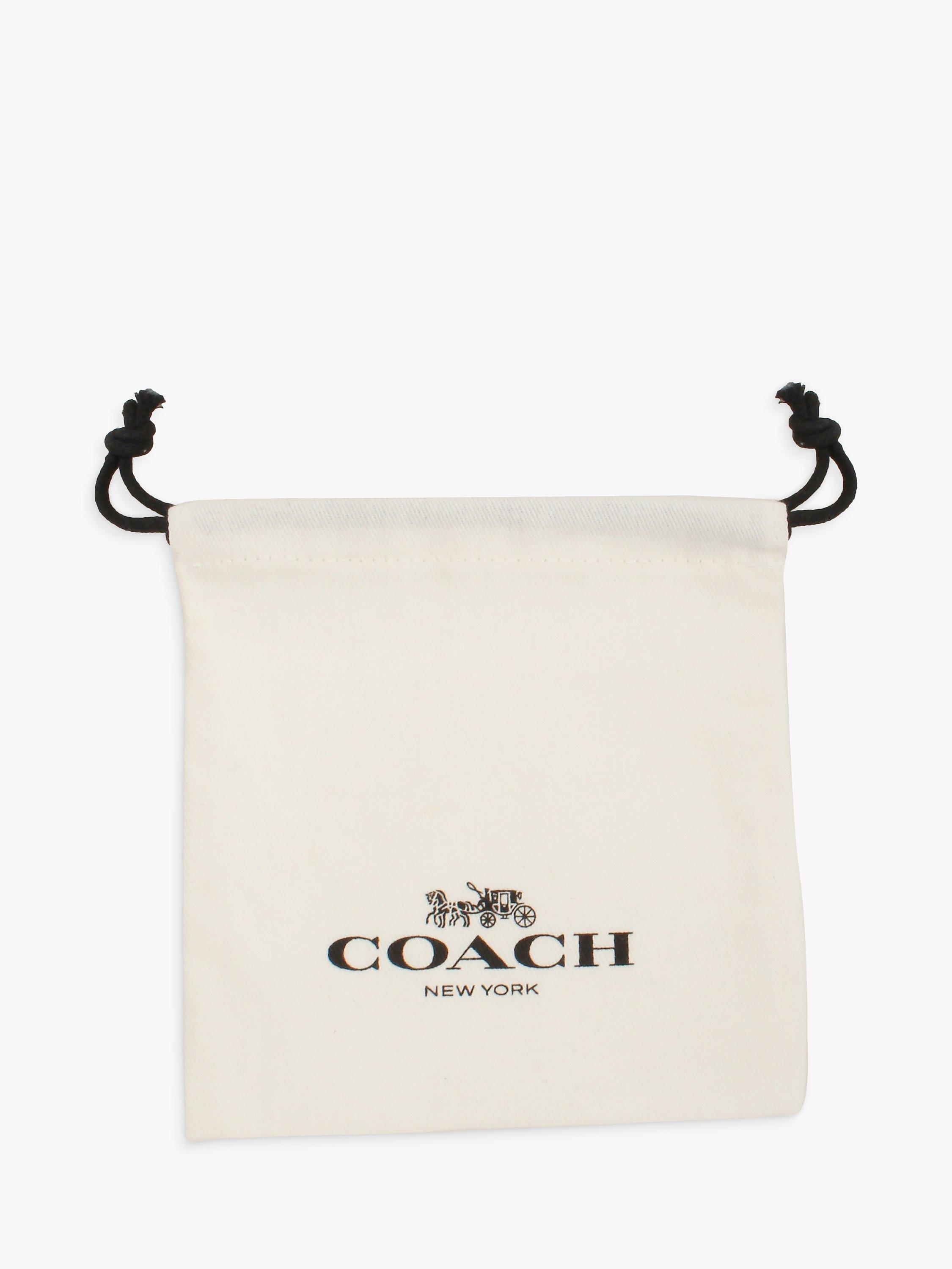 Product image 3 of 3, which shows Coach Signature C Huggie Hoop Earrings, Rhodium