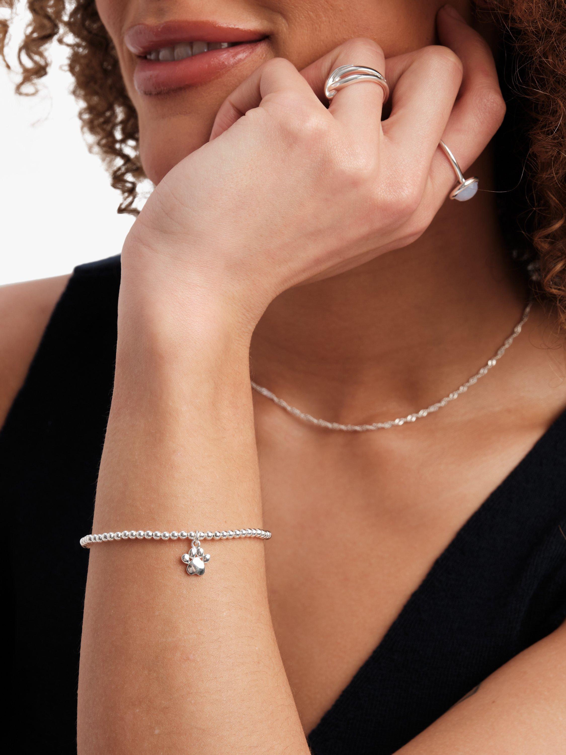 Product image 3 of 3, which shows Simply Silver Paw Charm Beaded Stretch Bracelet, Silver