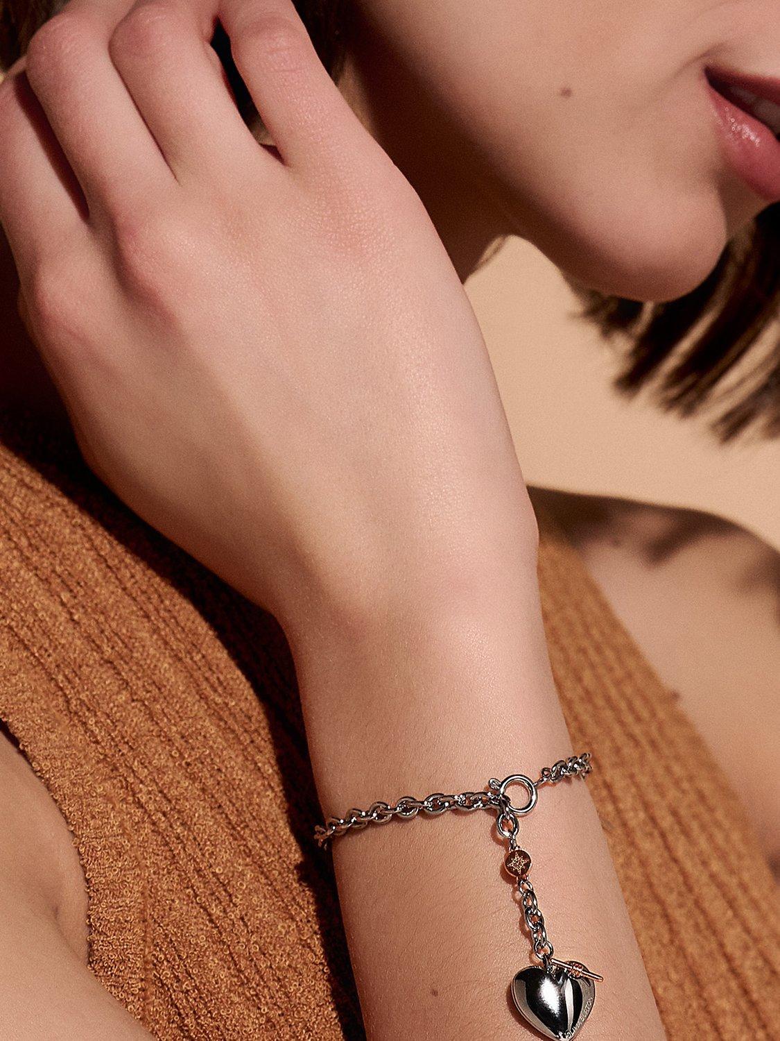 Product image 4 of 6, which shows Olivia Burton Knot Heart Bracelet, Silver