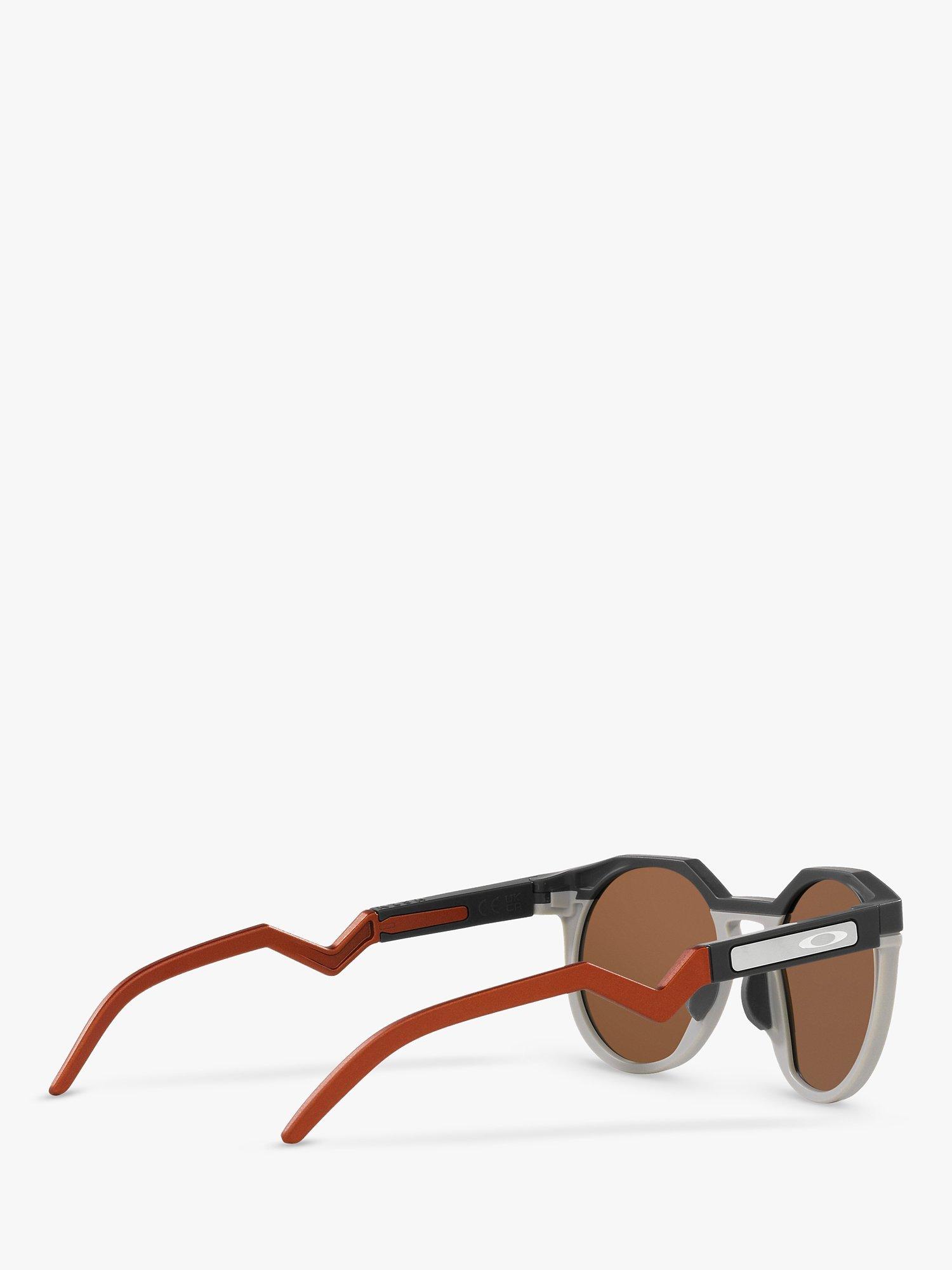 Product image 9 of 11, which shows Oakley OO9242 Men's Round Sunglasses, Matte Carbon