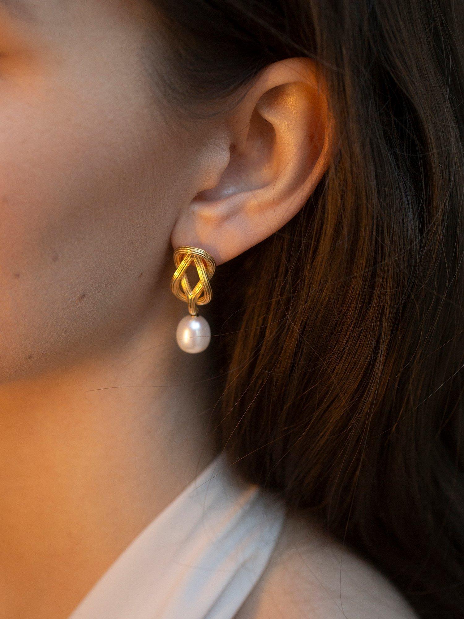 Product image 2 of 6, which shows Claudia Bradby Freshwater Pearl Connection Knots Drop Earrings, Gold