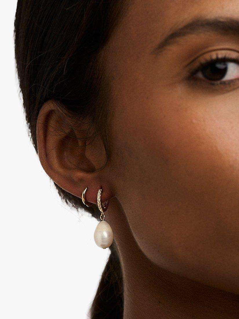 Product image 2 of 2, which shows Orelia Pearl Drop Pave Huggie Hoop Earrings, Pale Gold