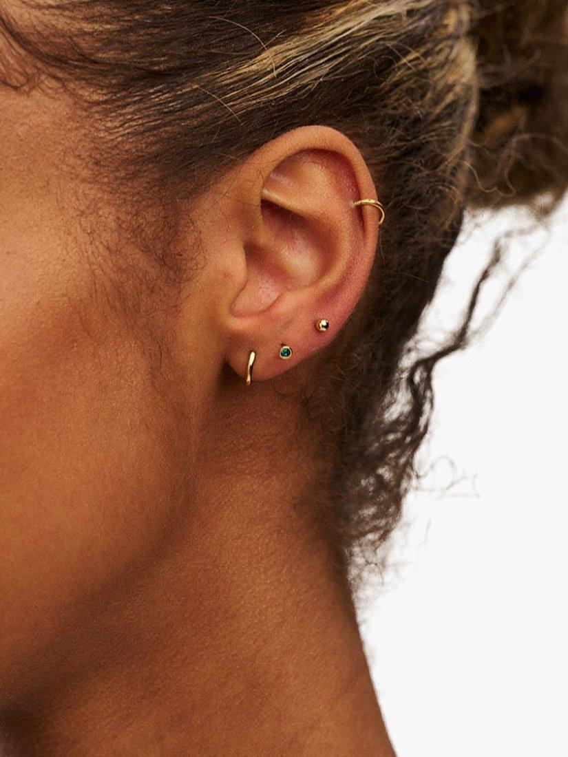 Product image 2 of 2, which shows Orelia Swarovski Emerald Stud & Hoop Earrings, Pack of 3, Pale Gold
