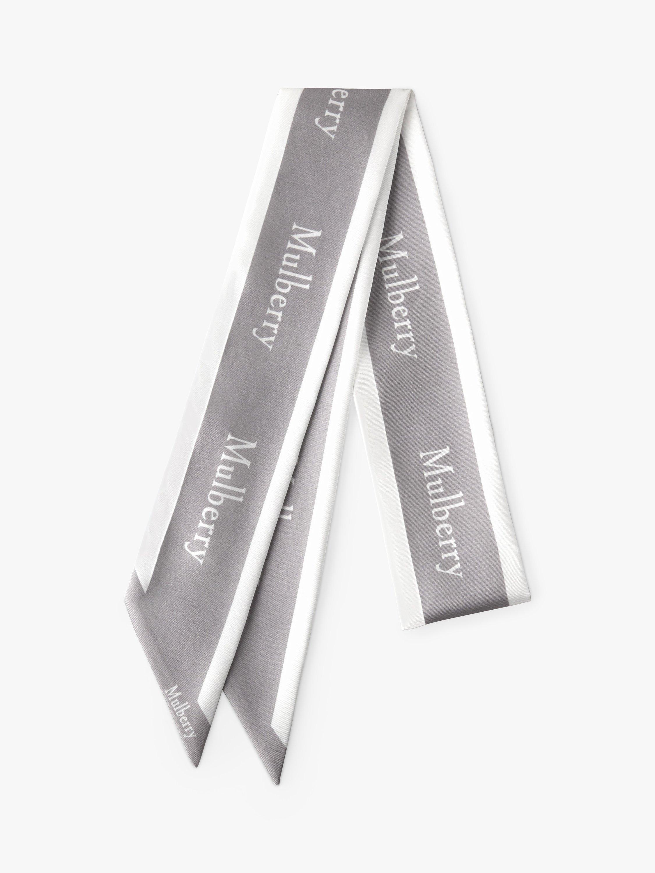 Product image 1 of 2, which shows Mulberry Logo Border Recycled Skinny Scarf, Pale Grey/White