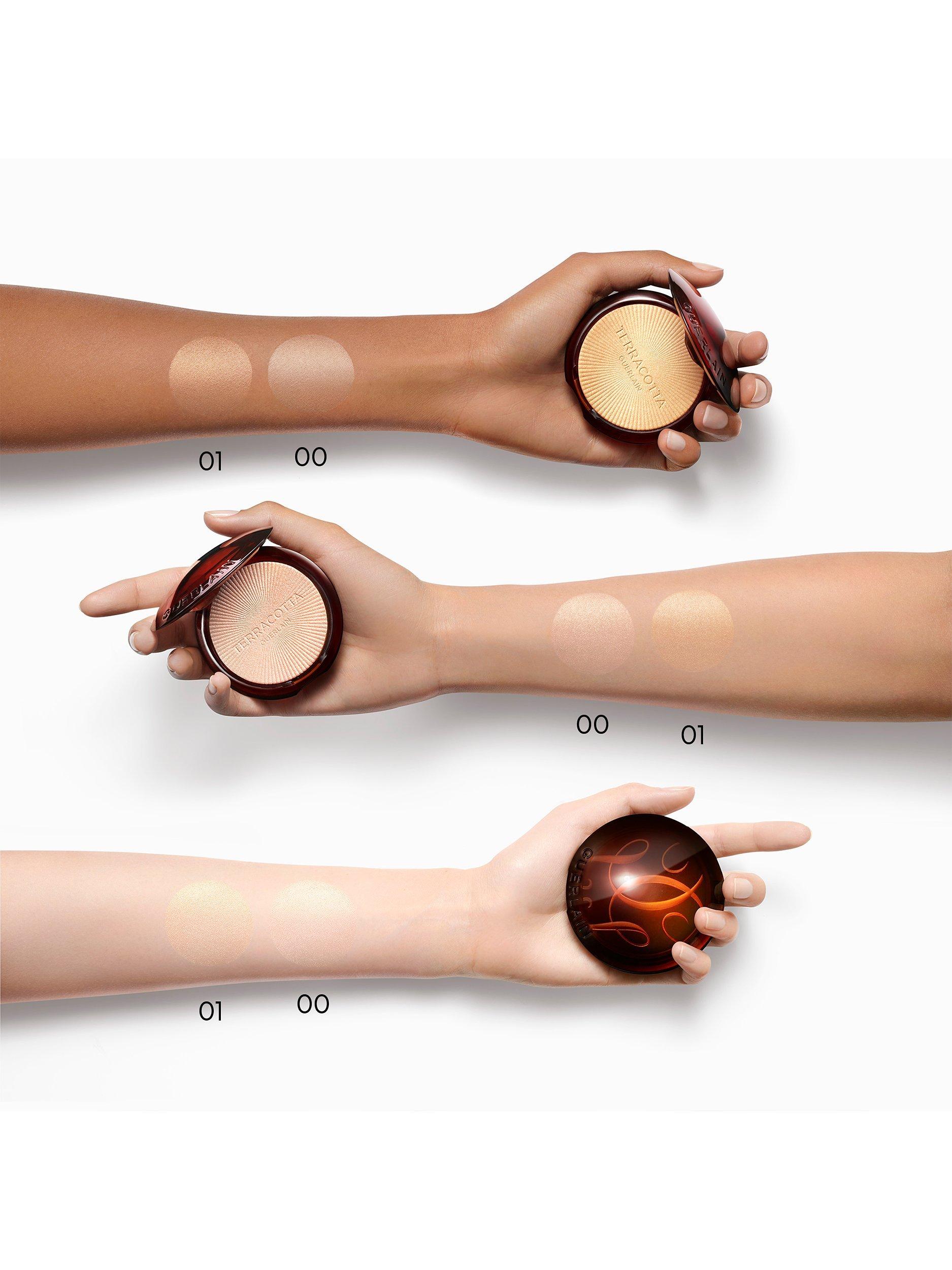 Product image 4 of 7, which shows Guerlain Terracotta Luminizer The Shimmering Powder Highlighting & Golden Glow, 01 Warm Gold