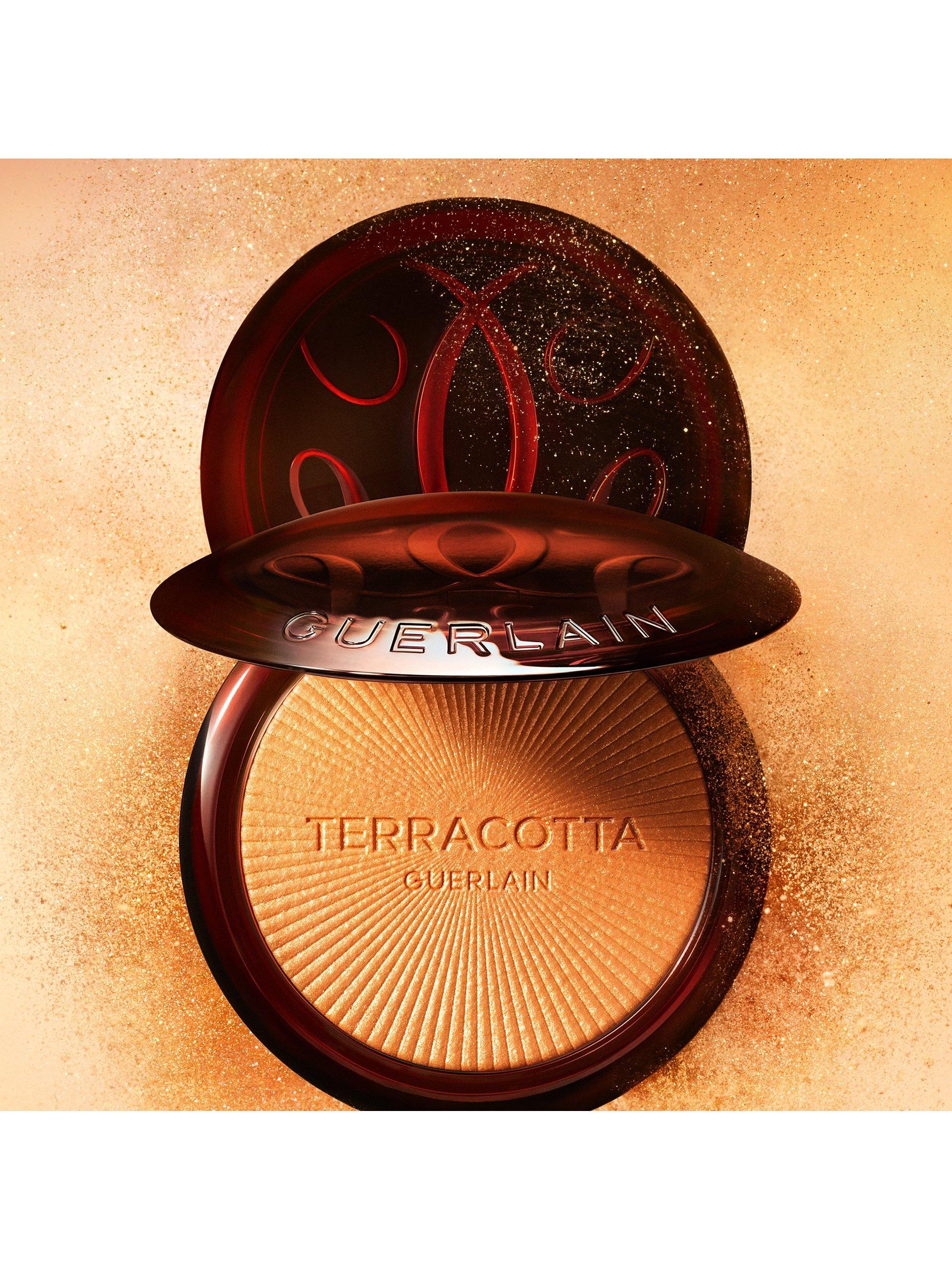 Product image 5 of 7, which shows Guerlain Terracotta Luminizer The Shimmering Powder Highlighting & Golden Glow, 01 Warm Gold