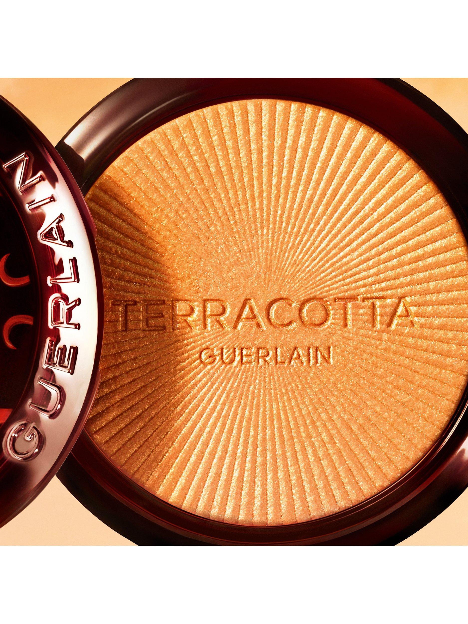 Product image 6 of 7, which shows Guerlain Terracotta Luminizer The Shimmering Powder Highlighting & Golden Glow, 01 Warm Gold