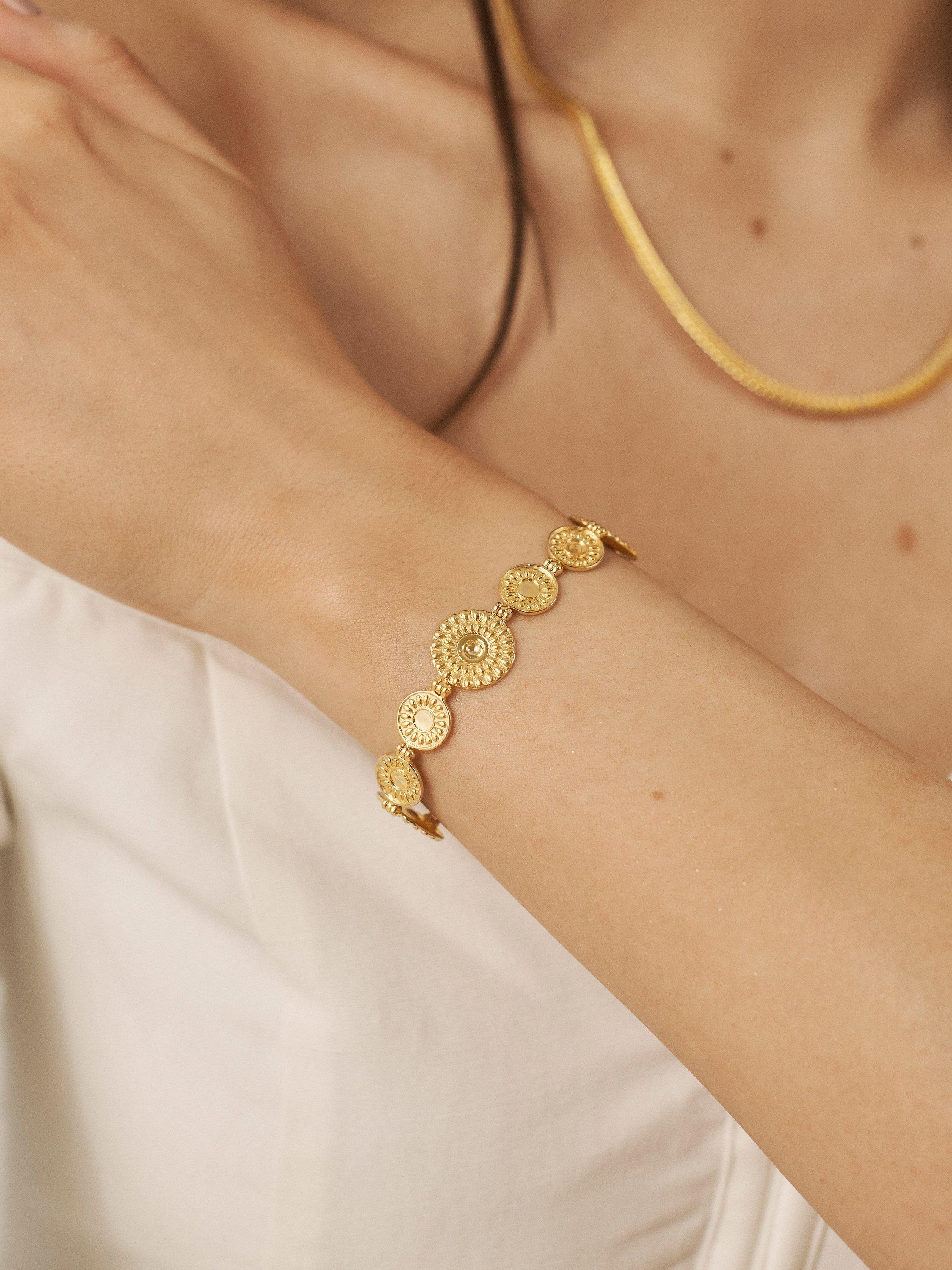 Product image 2 of 5, which shows Monica Vinader Juno Shield Bracelet, Gold, Small-Medium