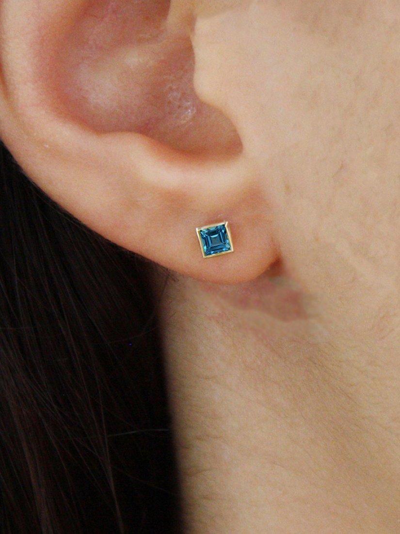 Product image 2 of 3, which shows E.W Adams 9ct Gold Princess Cut Topaz Square Stud Earrings, Gold/Blue