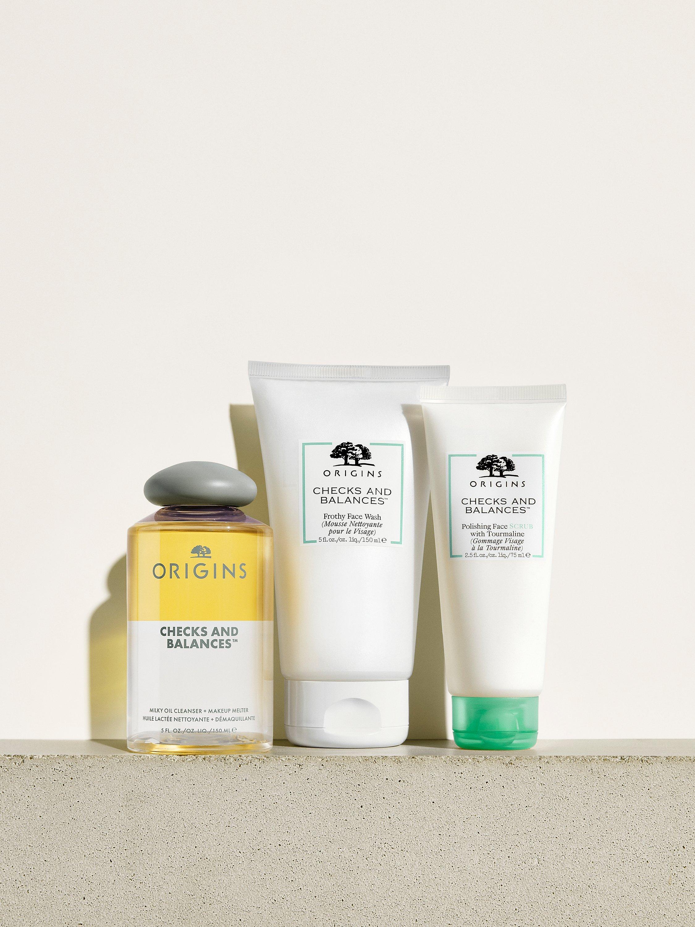Product image 9 of 10, which shows Origins Checks And Balances Milk to Oil Cleanser + Makeup Melter, 150ml