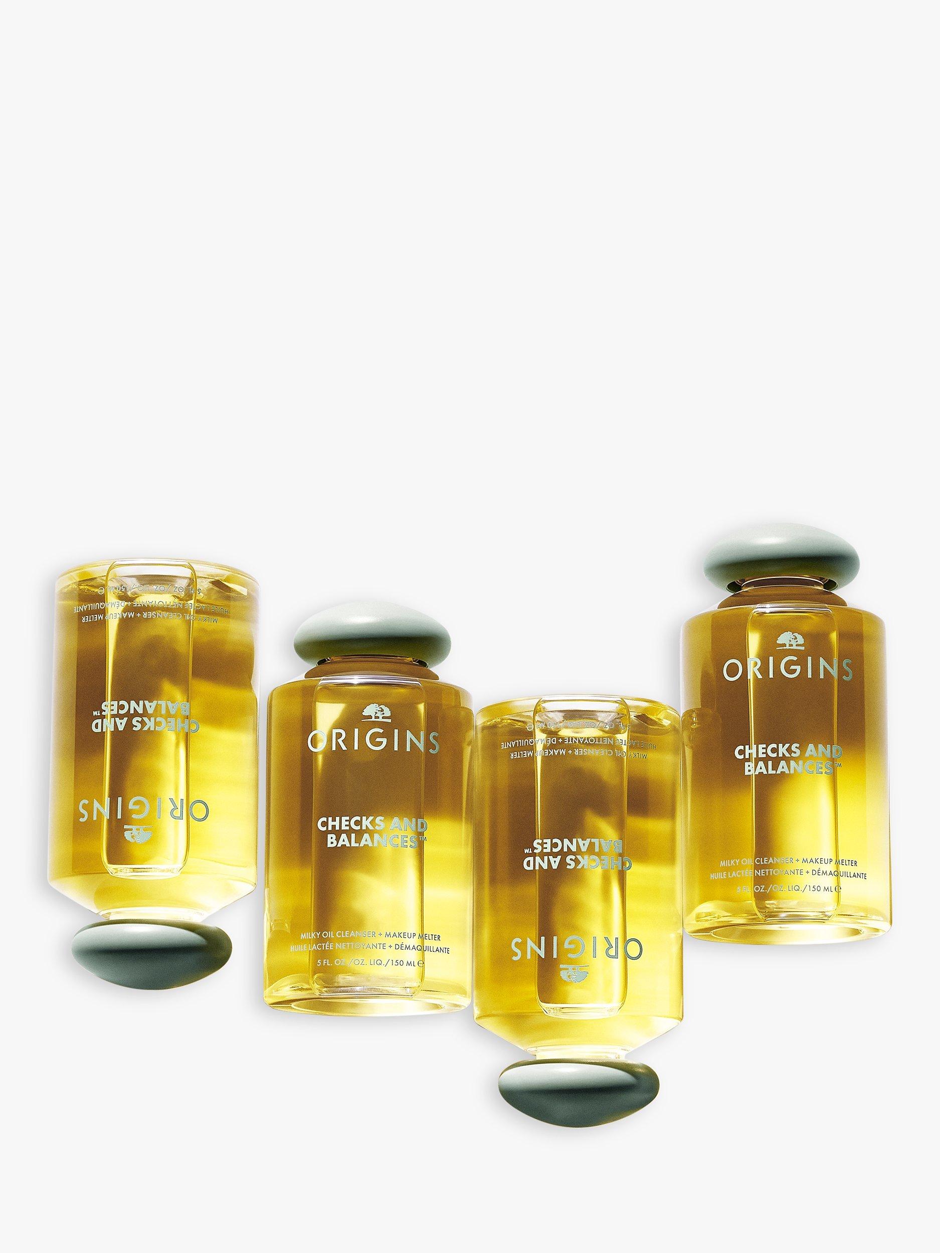 Product image 10 of 10, which shows Origins Checks And Balances Milk to Oil Cleanser + Makeup Melter, 150ml