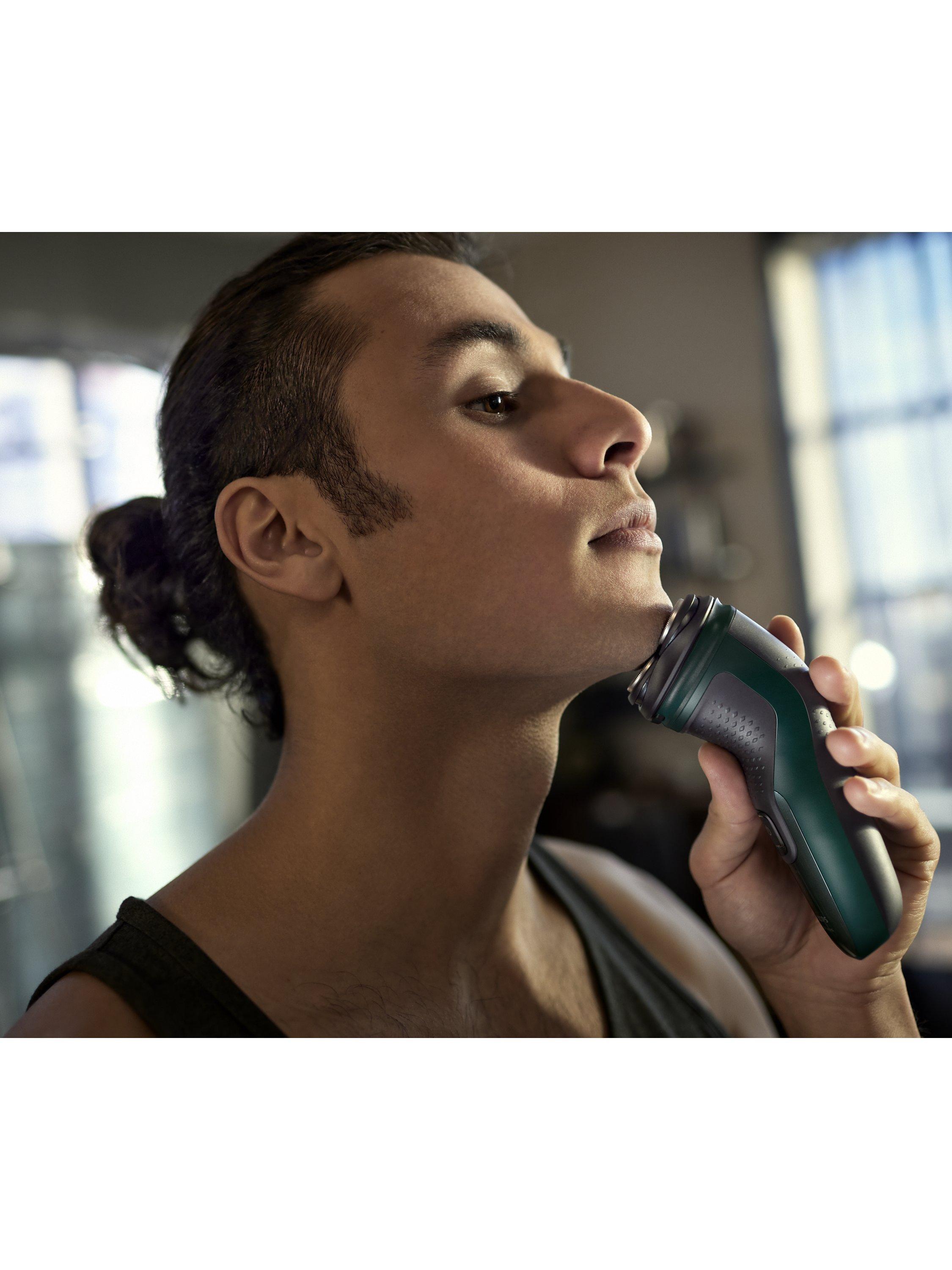 Product image 12 of 12, which shows Philips Series 3000X X3052/00 Wet & Dry Electric Shaver with 27 PowerCut Blades, 4D Flex Heads & Pop-up Trimmer, Dark Green Forest