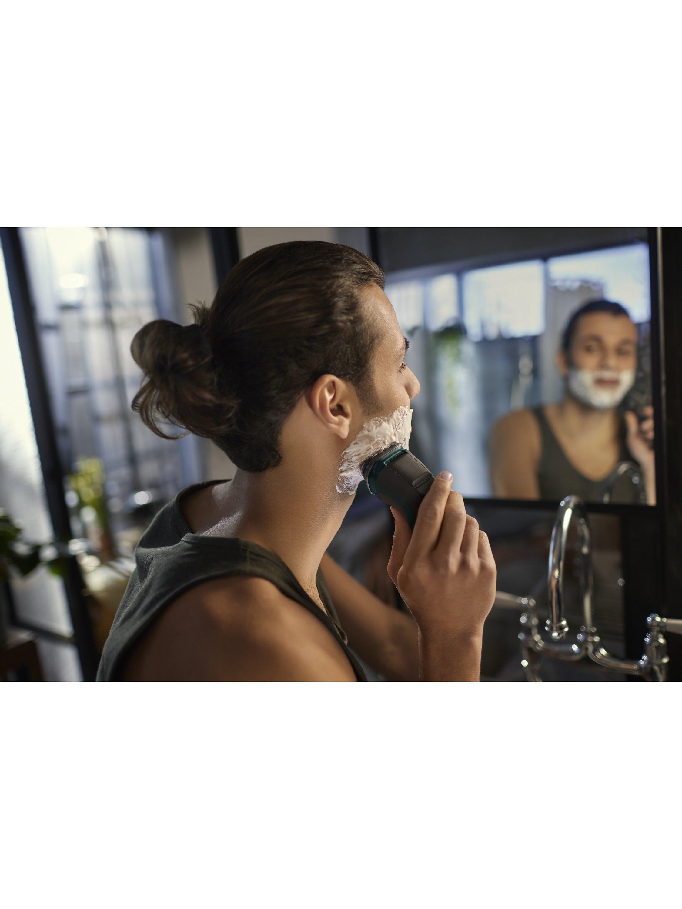 Product image 5 of 12, which shows Philips Series 3000X X3052/00 Wet & Dry Electric Shaver with 27 PowerCut Blades, 4D Flex Heads & Pop-up Trimmer, Dark Green Forest