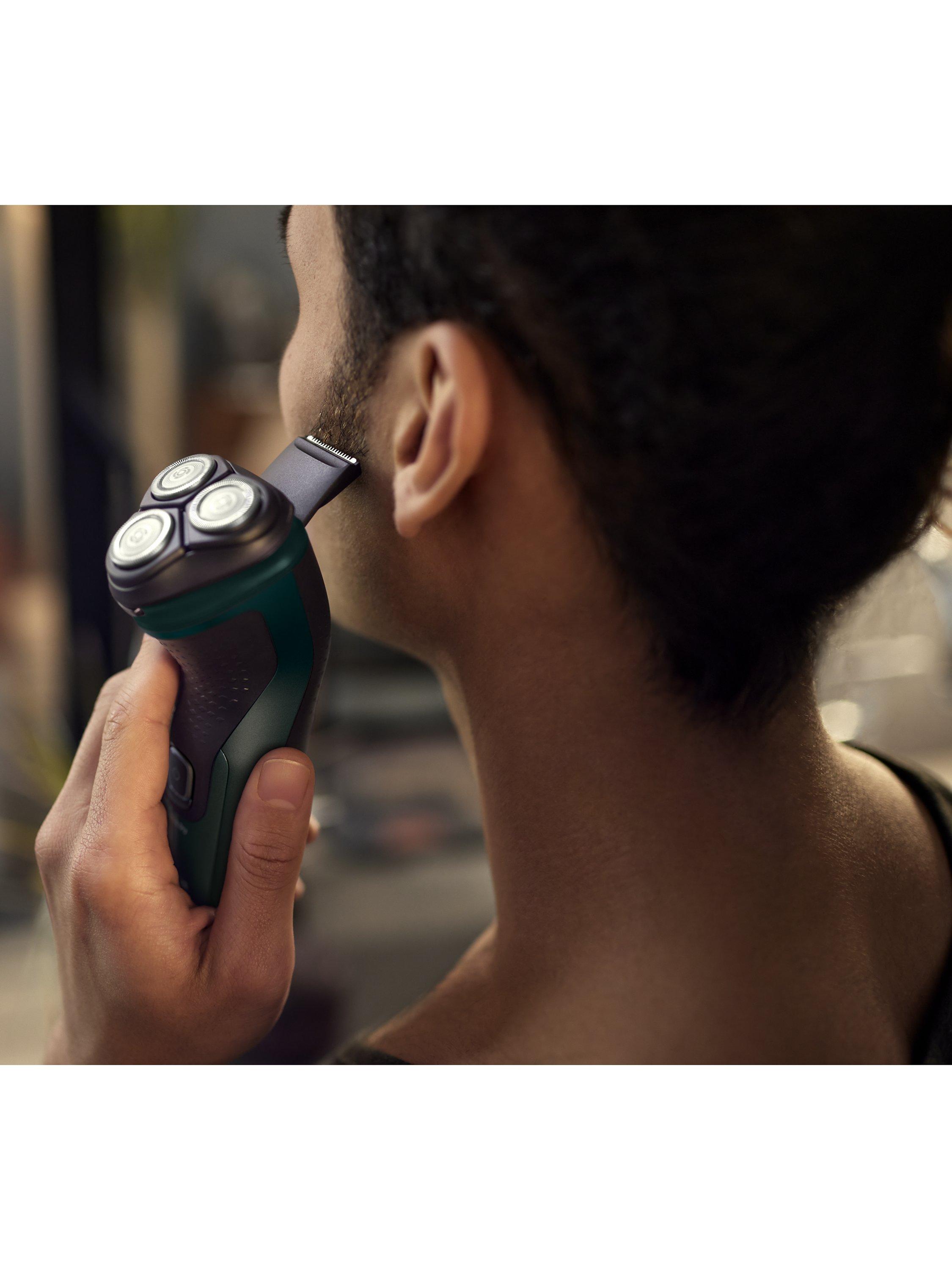 Product image 8 of 12, which shows Philips Series 3000X X3052/00 Wet & Dry Electric Shaver with 27 PowerCut Blades, 4D Flex Heads & Pop-up Trimmer, Dark Green Forest